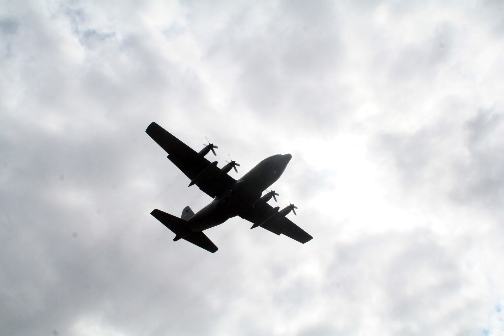 A C-130 Hercules participating in Air Mobility Rodeo 2011 returns from a competition sortie to Joint Base Lewis-McChord, Wash., on July 26, 2011. Rodeo 2011, sponsored by the Air Mobility Command, is the Mobility Air Force's readiness competition. This competition focuses on improving worldwide air mobility forces' professional core abilities. More than 150 teams and 3,000 people from the Air Force, and Air Force Reserve, as well as allied nations are participating in Rodeo. (U.S. Air Force Photo/Master Sgt. Scott T. Sturkol)