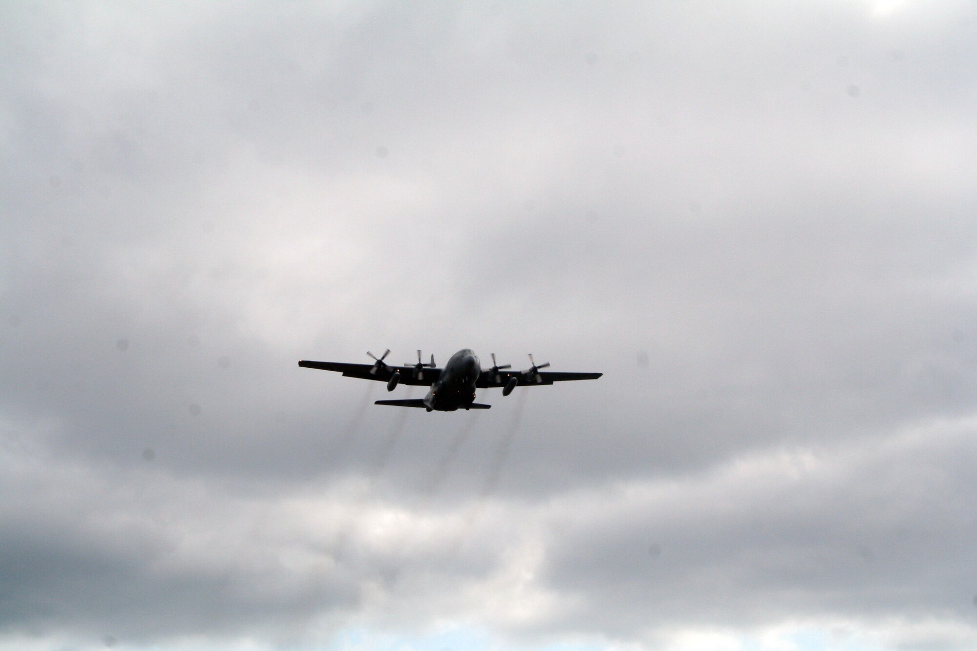 A C-130 Hercules participating in Air Mobility Rodeo 2011 returns from a competition sortie to Joint Base Lewis-McChord, Wash., on July 26, 2011. Rodeo 2011, sponsored by the Air Mobility Command, is the Mobility Air Force's readiness competition. This competition focuses on improving worldwide air mobility forces' professional core abilities. More than 150 teams and 3,000 people from the Air Force, and Air Force Reserve, as well as allied nations are participating in Rodeo. (U.S. Air Force Photo/Master Sgt. Scott T. Sturkol)