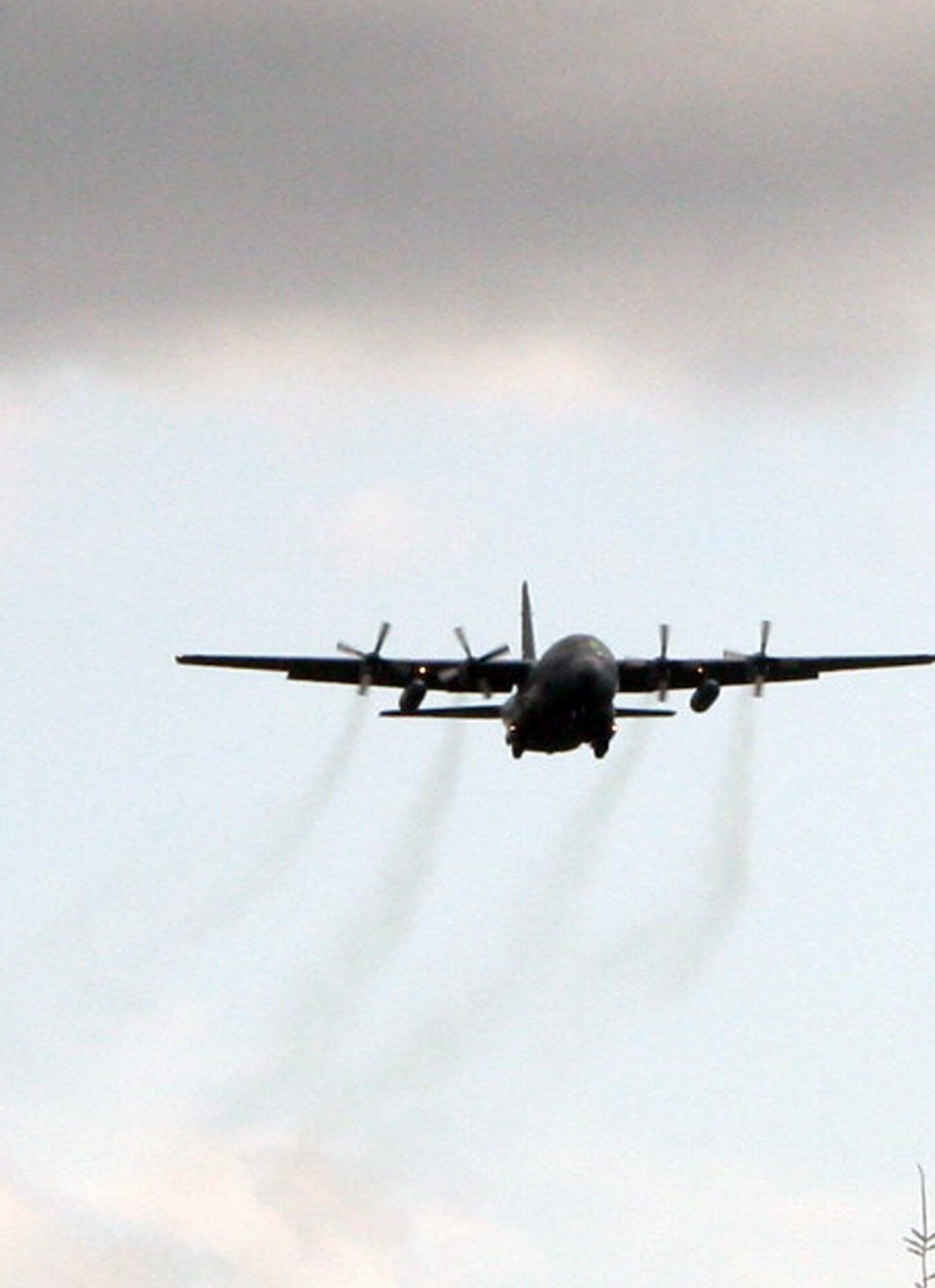 A C-130 Hercules participating in Air Mobility Rodeo 2011 returns from a competition sortie to Joint Base Lewis-McChord, Wash., on July 26, 2011. Rodeo 2011, sponsored by the Air Mobility Command, is the Mobility Air Force's readiness competition. This competition focuses on improving worldwide air mobility forces' professional core abilities. More than 150 teams and 3,000 people from the Air Force, and Air Force Reserve, as well as allied nations are participating in Rodeo. (U.S. Air Force Photo/Master Sgt. Scott T. Sturkol)