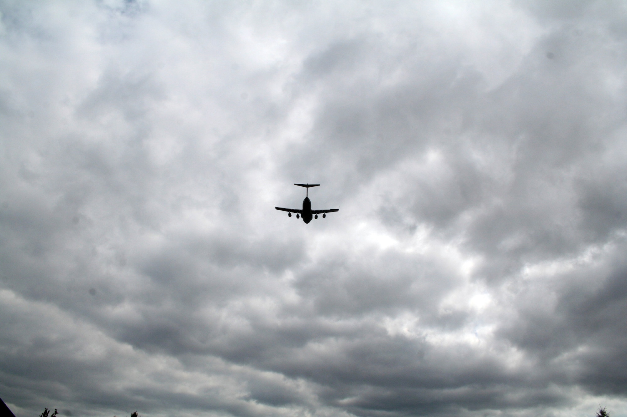 A C-17 Globemaster III participating in Air Mobility Rodeo 2011 takes off for a competition sortie to Joint Base Lewis-McChord, Wash., on July 26, 2011. Rodeo 2011, sponsored by the Air Mobility Command, is the Mobility Air Force's readiness competition. This competition focuses on improving worldwide air mobility forces' professional core abilities. More than 150 teams and 3,000 people from the Air Force, and Air Force Reserve, as well as allied nations are participating in Rodeo. (U.S. Air Force Photo/Master Sgt. Scott T. Sturkol)
