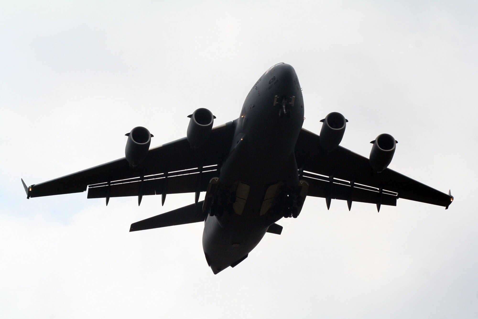 A C-17 Globemaster III participating in Air Mobility Rodeo 2011 returns from a competition sortie to Joint Base Lewis-McChord, Wash., on July 26, 2011. Rodeo 2011, sponsored by the Air Mobility Command, is the Mobility Air Force's readiness competition. This competition focuses on improving worldwide air mobility forces' professional core abilities. More than 150 teams and 3,000 people from the Air Force, and Air Force Reserve, as well as allied nations are participating in Rodeo. (U.S. Air Force Photo/Master Sgt. Scott T. Sturkol)