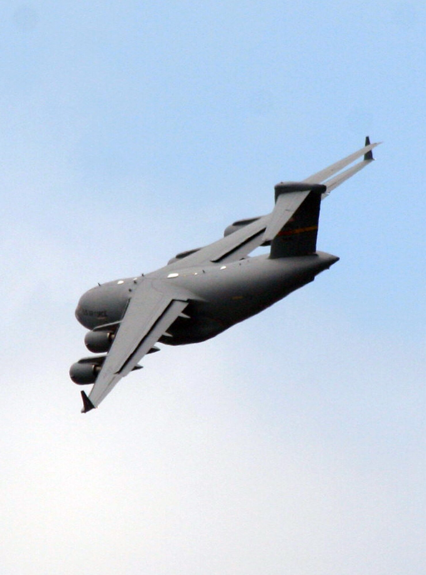 A C-17 Globemaster III participating in Air Mobility Rodeo 2011 returns from a competition sortie to Joint Base Lewis-McChord, Wash., on July 26, 2011. Rodeo 2011, sponsored by the Air Mobility Command, is the Mobility Air Force's readiness competition. This competition focuses on improving worldwide air mobility forces' professional core abilities. More than 150 teams and 3,000 people from the Air Force, and Air Force Reserve, as well as allied nations are participating in Rodeo. (U.S. Air Force Photo/Master Sgt. Scott T. Sturkol)
