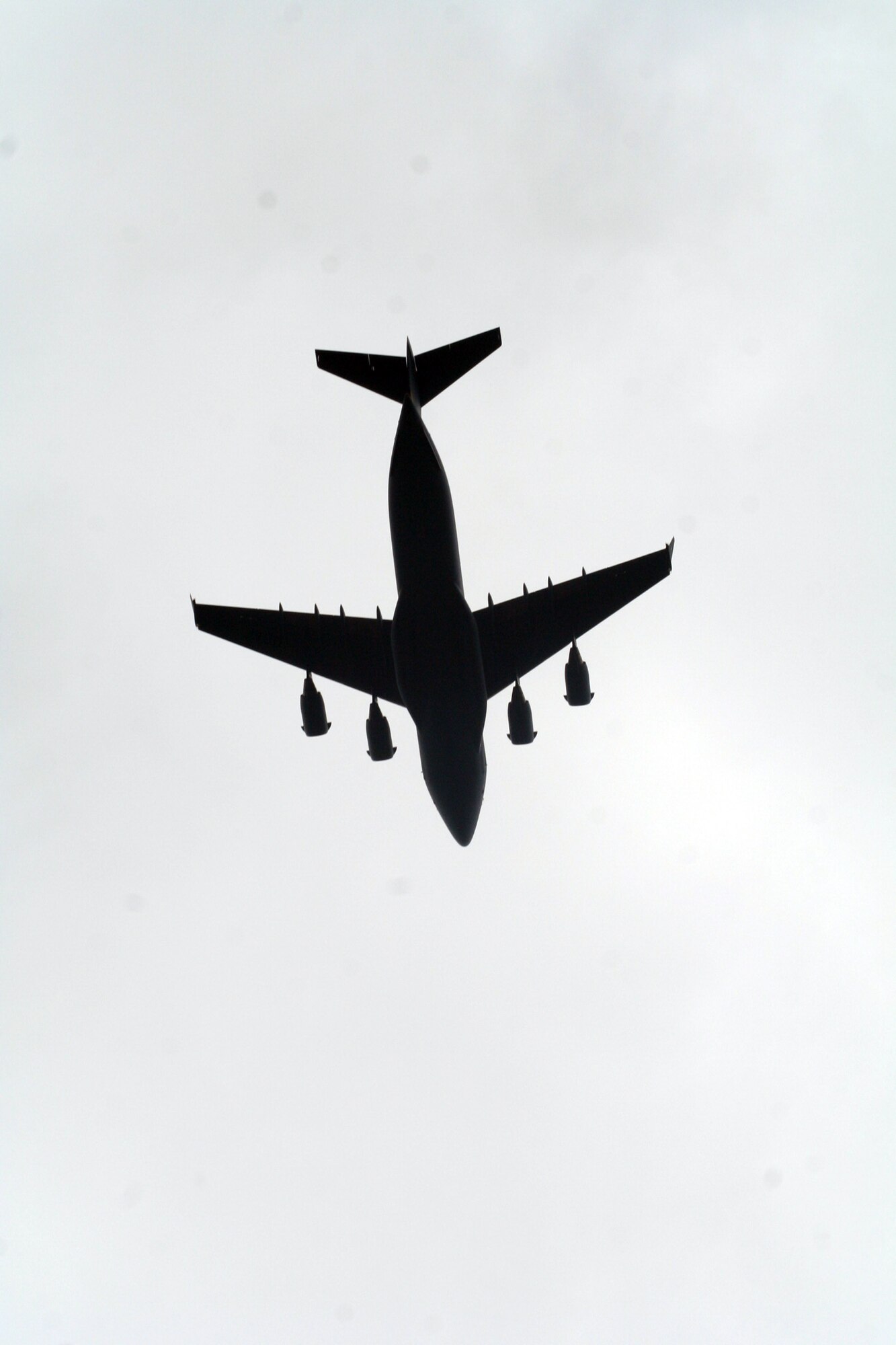 A C-17 Globemaster III participating in Air Mobility Rodeo 2011 returns from a competition sortie to Joint Base Lewis-McChord, Wash., on July 26, 2011. Rodeo 2011, sponsored by the Air Mobility Command, is the Mobility Air Force's readiness competition. This competition focuses on improving worldwide air mobility forces' professional core abilities. More than 150 teams and 3,000 people from the Air Force, and Air Force Reserve, as well as allied nations are participating in Rodeo. (U.S. Air Force Photo/Master Sgt. Scott T. Sturkol)