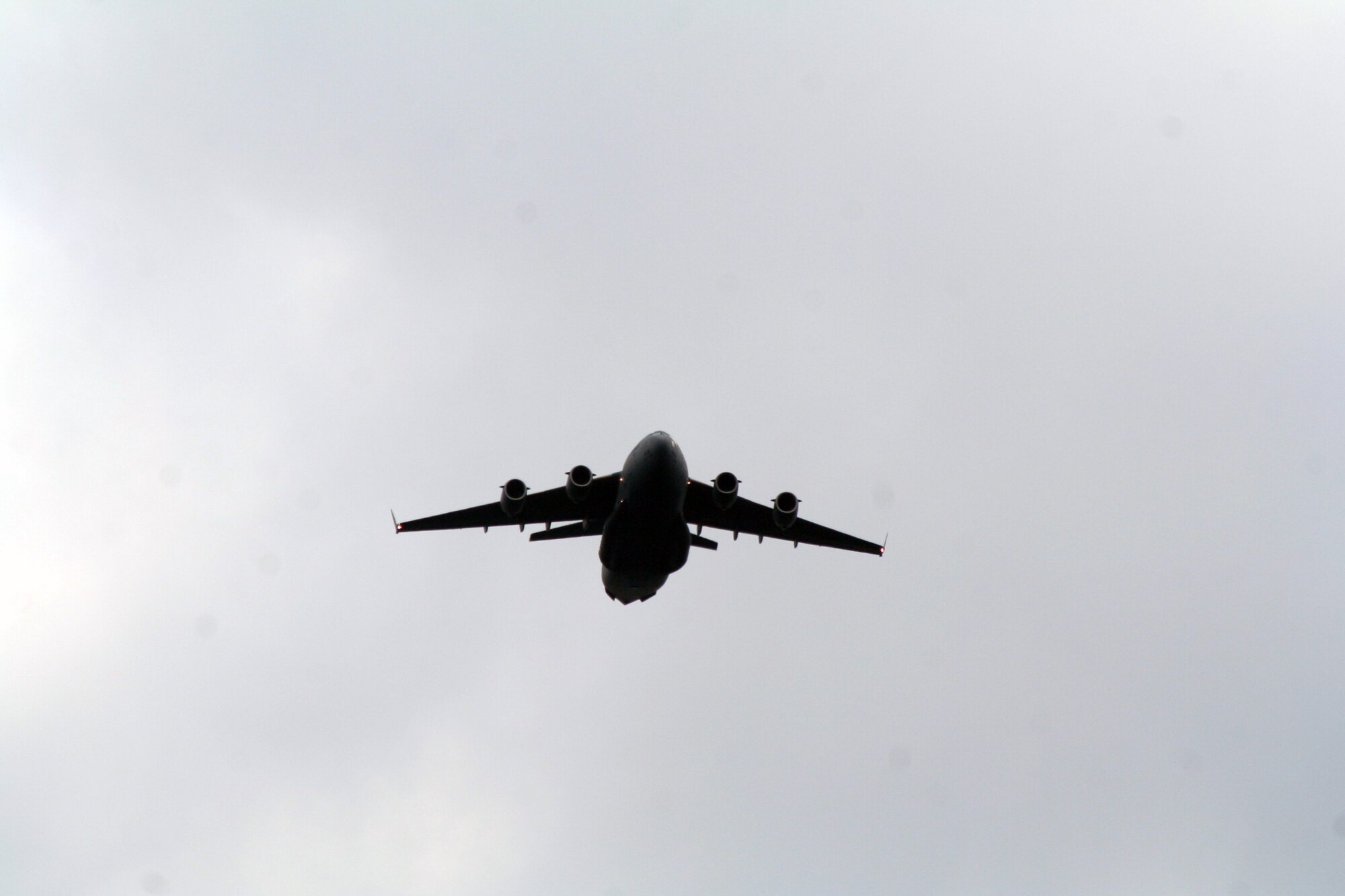 A C-17 Globemaster III participating in Air Mobility Rodeo 2011 returns from a competition sortie to Joint Base Lewis-McChord, Wash., on July 26, 2011. Rodeo 2011, sponsored by the Air Mobility Command, is the Mobility Air Force's readiness competition. This competition focuses on improving worldwide air mobility forces' professional core abilities. More than 150 teams and 3,000 people from the Air Force, and Air Force Reserve, as well as allied nations are participating in Rodeo. (U.S. Air Force Photo/Master Sgt. Scott T. Sturkol)
