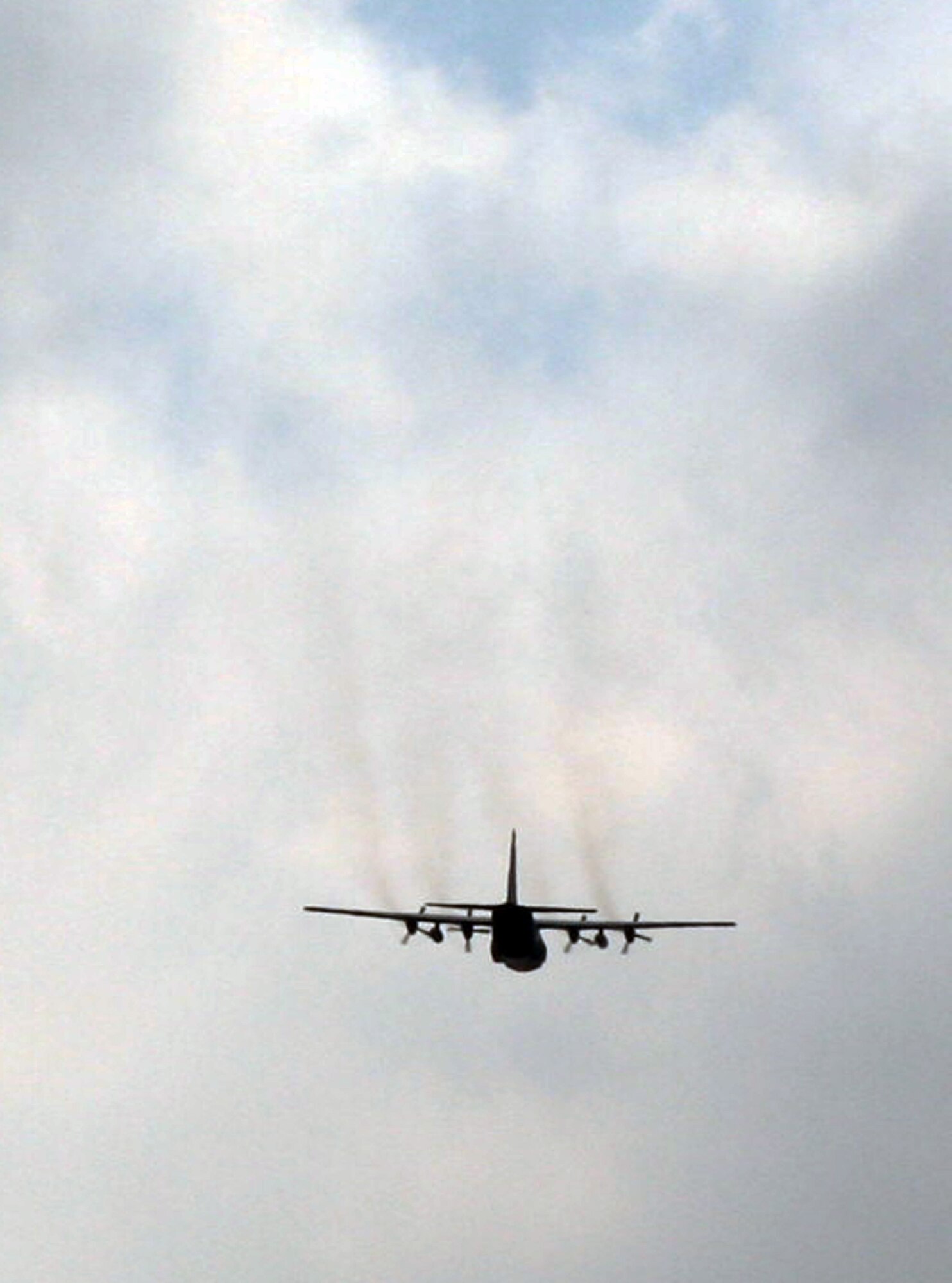 A C-130 Hercules participating in Air Mobility Rodeo 2011 returns from a competition sortie to Joint Base Lewis-McChord, Wash., on July 26, 2011. Rodeo 2011, sponsored by the Air Mobility Command, is the Mobility Air Force's readiness competition. This competition focuses on improving worldwide air mobility forces' professional core abilities. More than 150 teams and 3,000 people from the Air Force, and Air Force Reserve, as well as allied nations are participating in Rodeo. (U.S. Air Force Photo/Master Sgt. Scott T. Sturkol)