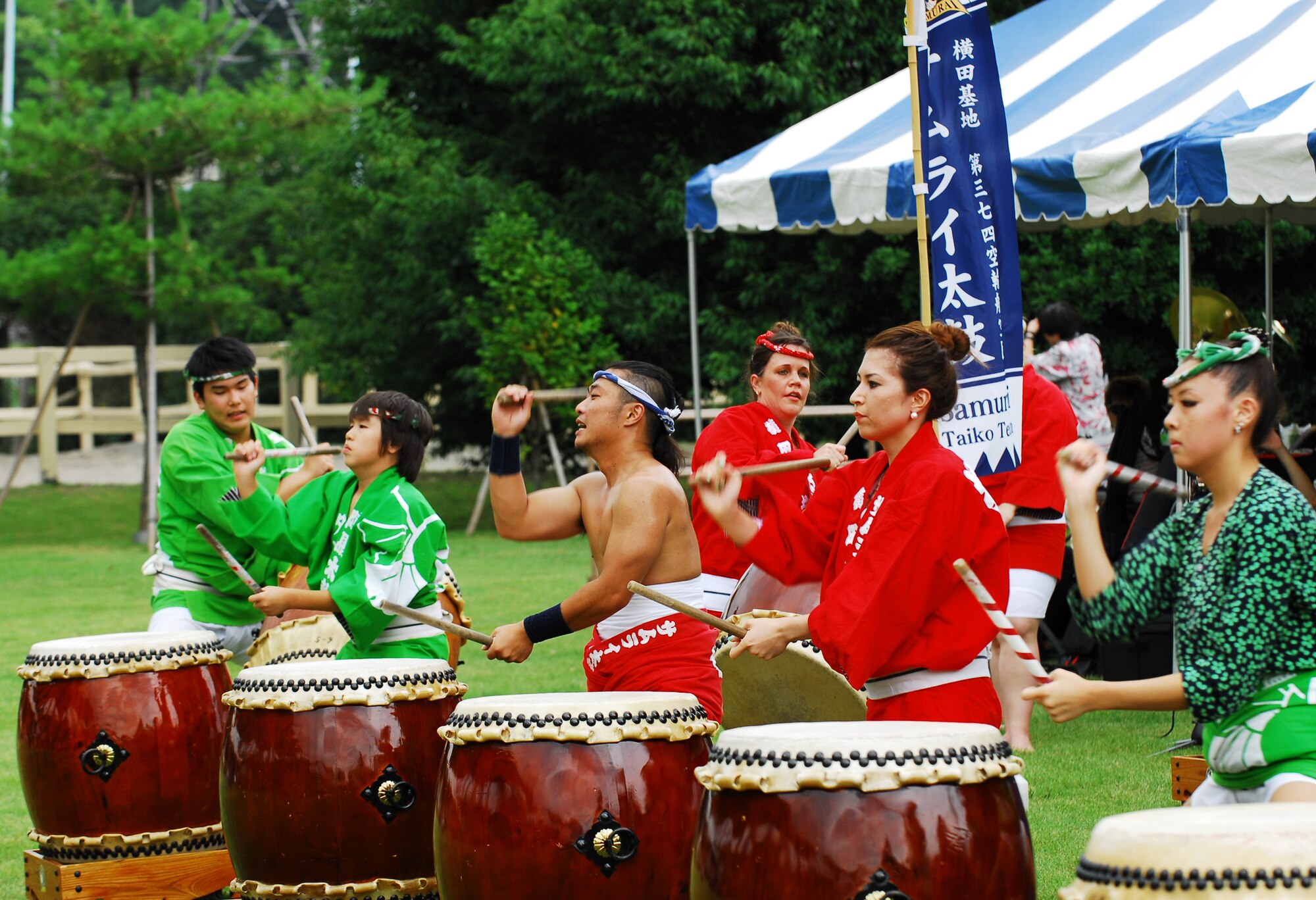 INAGI CITY, Japan -- Members of the Samurai Taiko Team from Yokota Air Base, Japan, perform during the 31st annual Inagi Festival held at Tama Hills Recreation Center, Inagi City, Japan, July 24, 2011. The event included entertainment, food and activities for children. (U.S. Air Force photo/Staff Sgt. Robin Stanchak)  