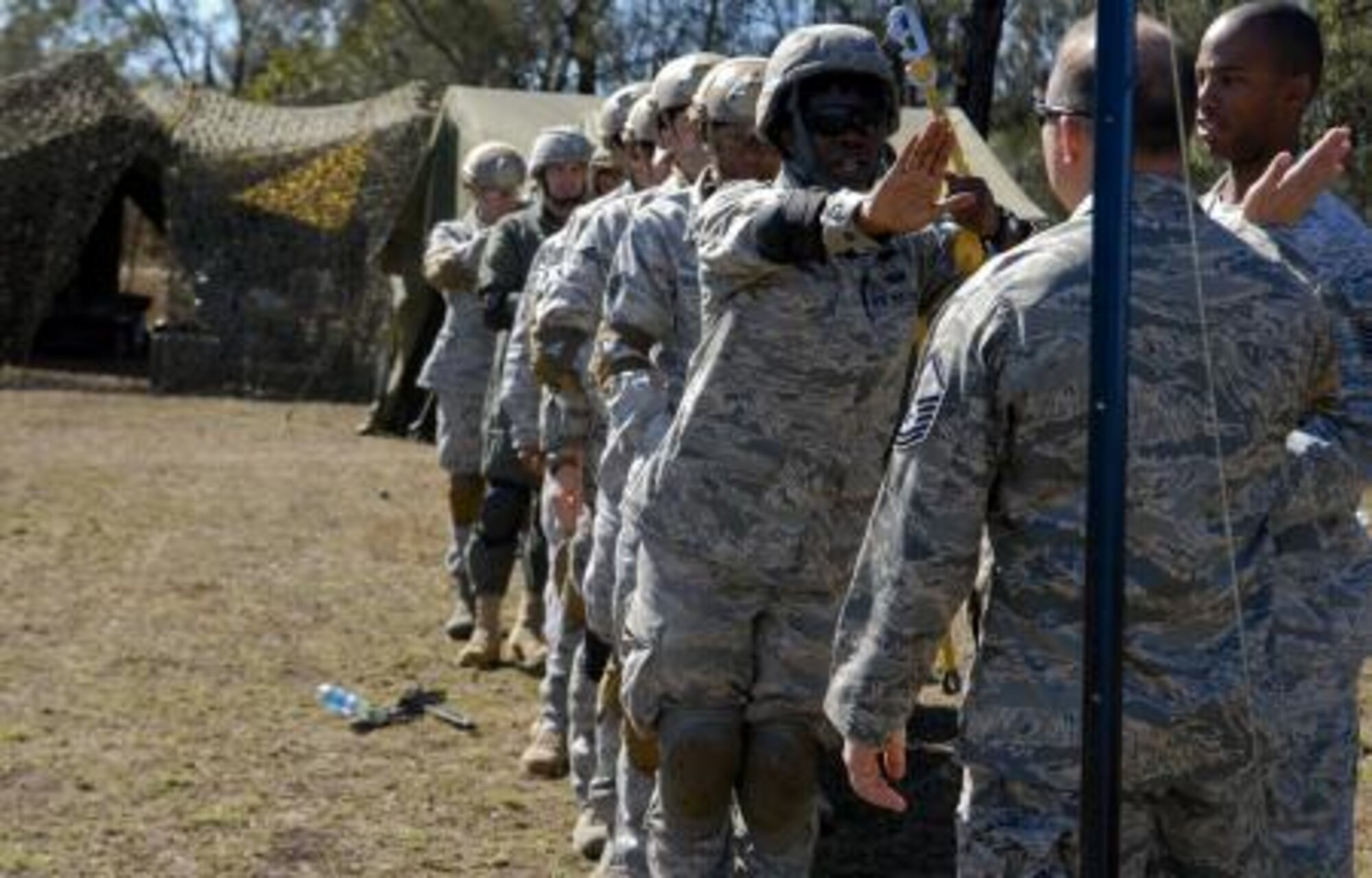 Members from the 36th Contingency Response Group here particpate in airborne sustainment training prior to a jump during Talisman Sabre 2011. Talisman Sabre 2011 is an exercise designed to train U.S. and Australian forces to plan and conduct combined task force operations to improve combat readiness and interoperability on a variety of missions from conventional conflict to peacekeeping and humanitarian efforts. (Photo by Sara Csurilla)