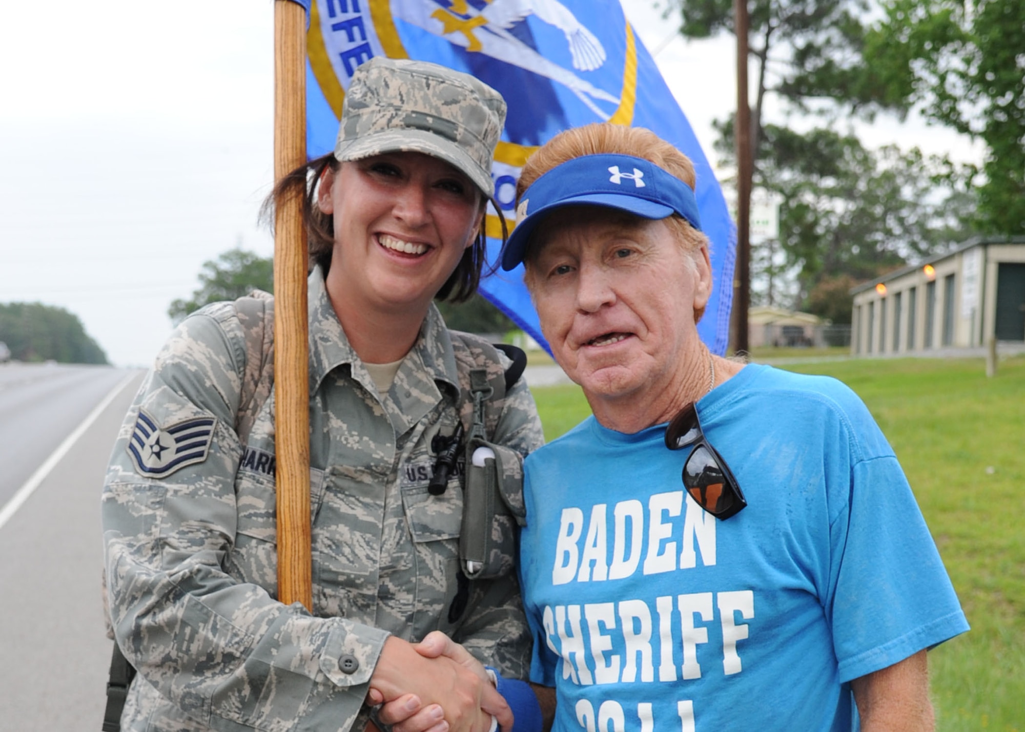 Staff Sgt. Nicole Harris, 14th Security Forces Squadron, poses with retired Air Force master sergeant Kenny Johnson outside Pineville La. on July 25. Kenny Johnson said that during his time in the Air Force he was a security policeman, the predecessor to the security forces career field. (U.S. Air Force photo/Airman 1st Class Chase Hedrick).