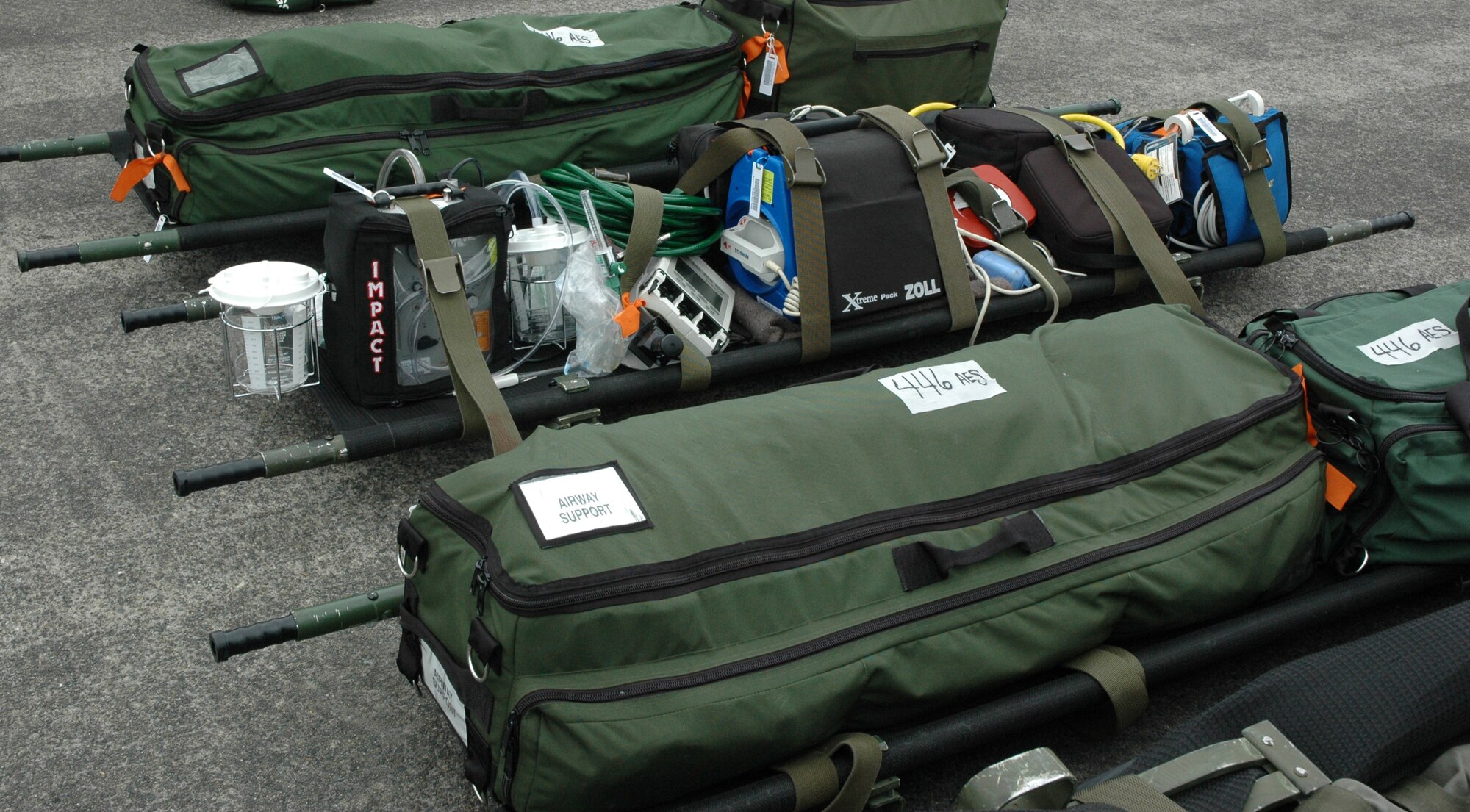 Equipment sits on the tarmac waiting for the 446th Airlift Wing's Rodeo aeromedical team to load it on a KC-135 configured for aeromedical evacuation capability during Air Mobility Command's Rodeo July 26 at McChord Field, Wash. (U.S. Air Force photo by Sandra Pishner)