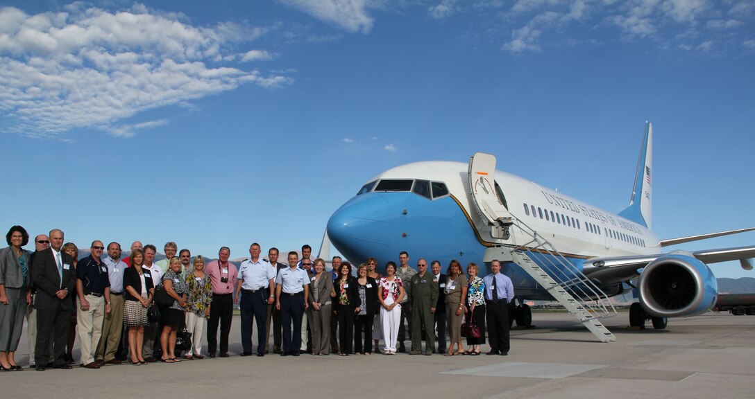 Area civic leaders stand next to the C-40C of the 932nd Airlift Wing that flew them to Petersen Air Force Base, Colo. for a day-long tour on July 21.  The civic group visited the U.S. Air Force Academy, U.S. Northern Command and the 302nd Airlift Wing.   Educators, counselors, fire chiefs and businessmen received briefings from senior leaders to gain a better understanding of the active duty and Air Force Reserve missions.  (U.S. Air Force photo/Tech. Sgt. Dan Oliver)