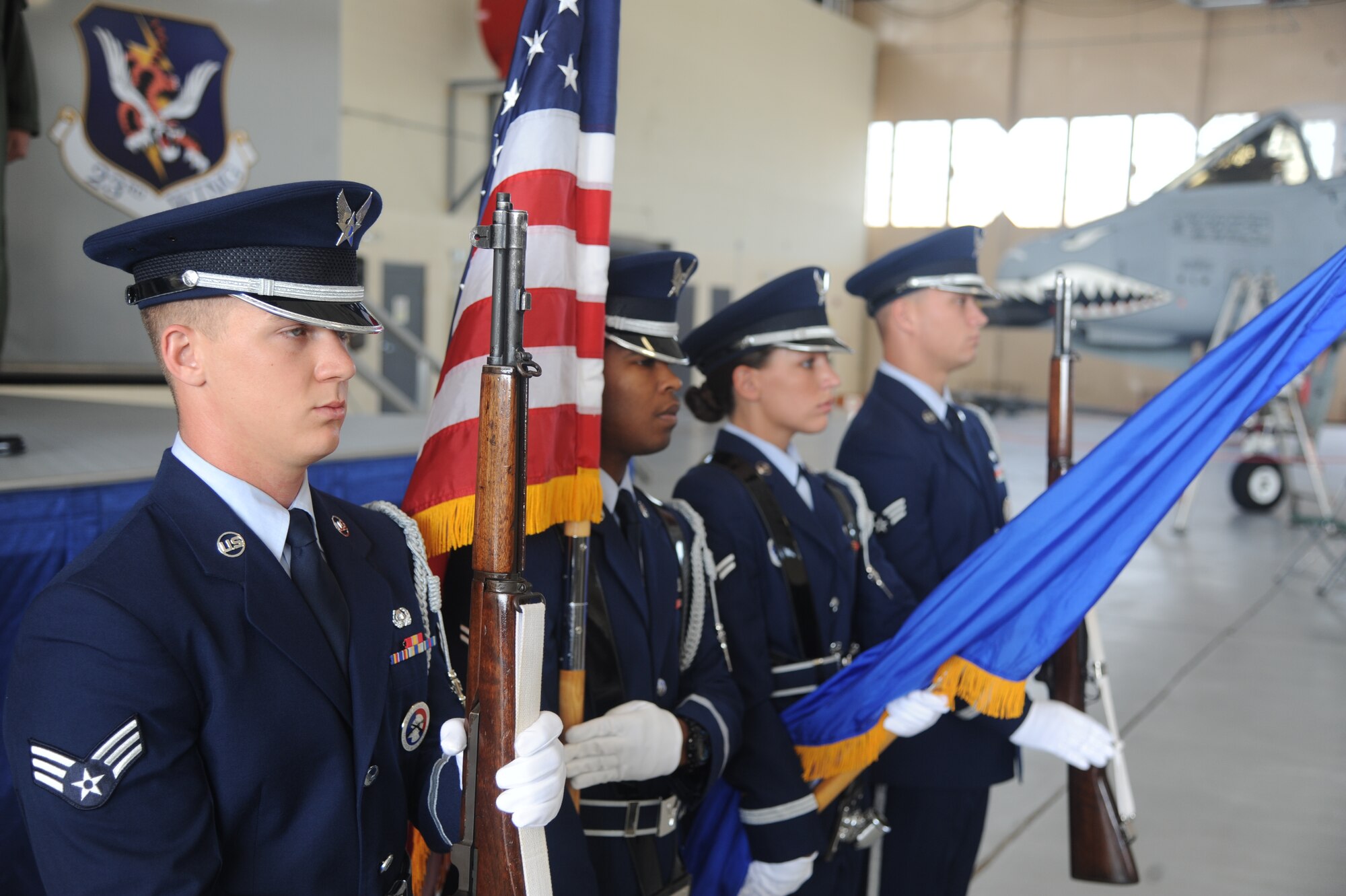 The Moody Air Force Base Honor Guard presents the colors during the 23rd Fighter Group change of command July 26, 2011. During the ceremony,  U.S. Air Force Col. Skip Hinman relinquished command of the group to Col. Billy Thompson. (U.S Air Force photo by Airman 1st Class Paul Francis/Released)
