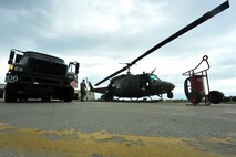 MINOT AIR FORCE BASE, N.D. -- A UH-1N “Huey” helicopter is refueled after a routine flying mission, here July 26. The mission of the 54th HS is to ensure the integrity of the 91st Missile Wing’s nuclear deterrence by providing immediate, flexible and effective combat helicopter support anywhere, anytime. (U.S. Air Force photo/ Senior Airman Jesse Lopez)