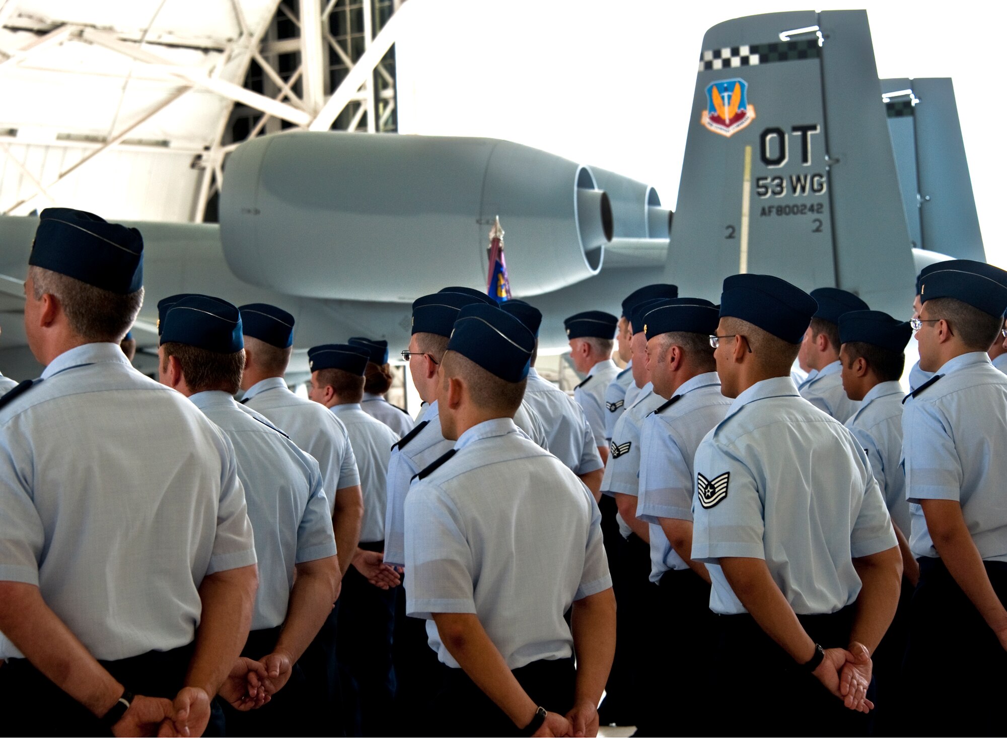 Members of the 53rd Electronic Warfare Group stand in formation behind the newest 53rd Wing flagship, the A-10 Thunderbolt II during the wing’s change of command ceremony at Eglin Air Force Base, Fla., July 26.  Col. David Hicks, a command pilot in the A-10, took command of the wing from Col. Michael Gantt.  (U.S. Air Force photo/Samuel King Jr.)