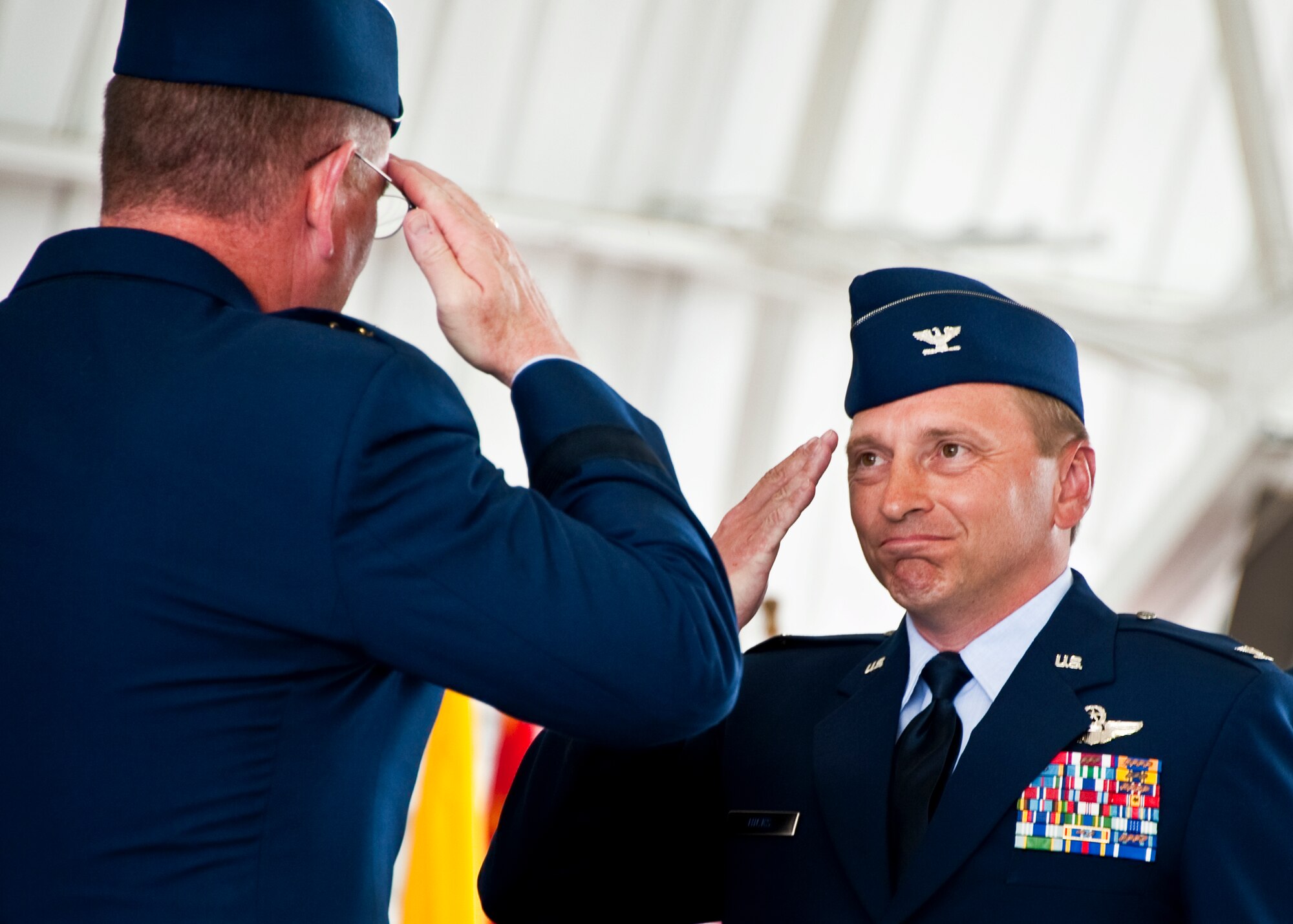 New 53rd Wing commander, Col. David Hicks, salutes Maj. Gen. James Hyatt, the U.S. Air Force Warfare Center commander, during the wing’s change of command ceremony at Eglin Air Force Base, Fla., July 26.  Hicks took command of the wing from Col. Michael Gantt.  (U.S. Air Force photo/Samuel King Jr.)