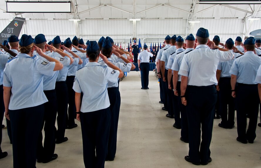Col. Michael Gantt gives his final salute as commander to the 53rd Wing during the wing’s change of command ceremony at Eglin Air Force Base, Fla., July 26.  Col. David Hicks took command of the wing from Gantt.  (U.S. Air Force photo/Samuel King Jr.)