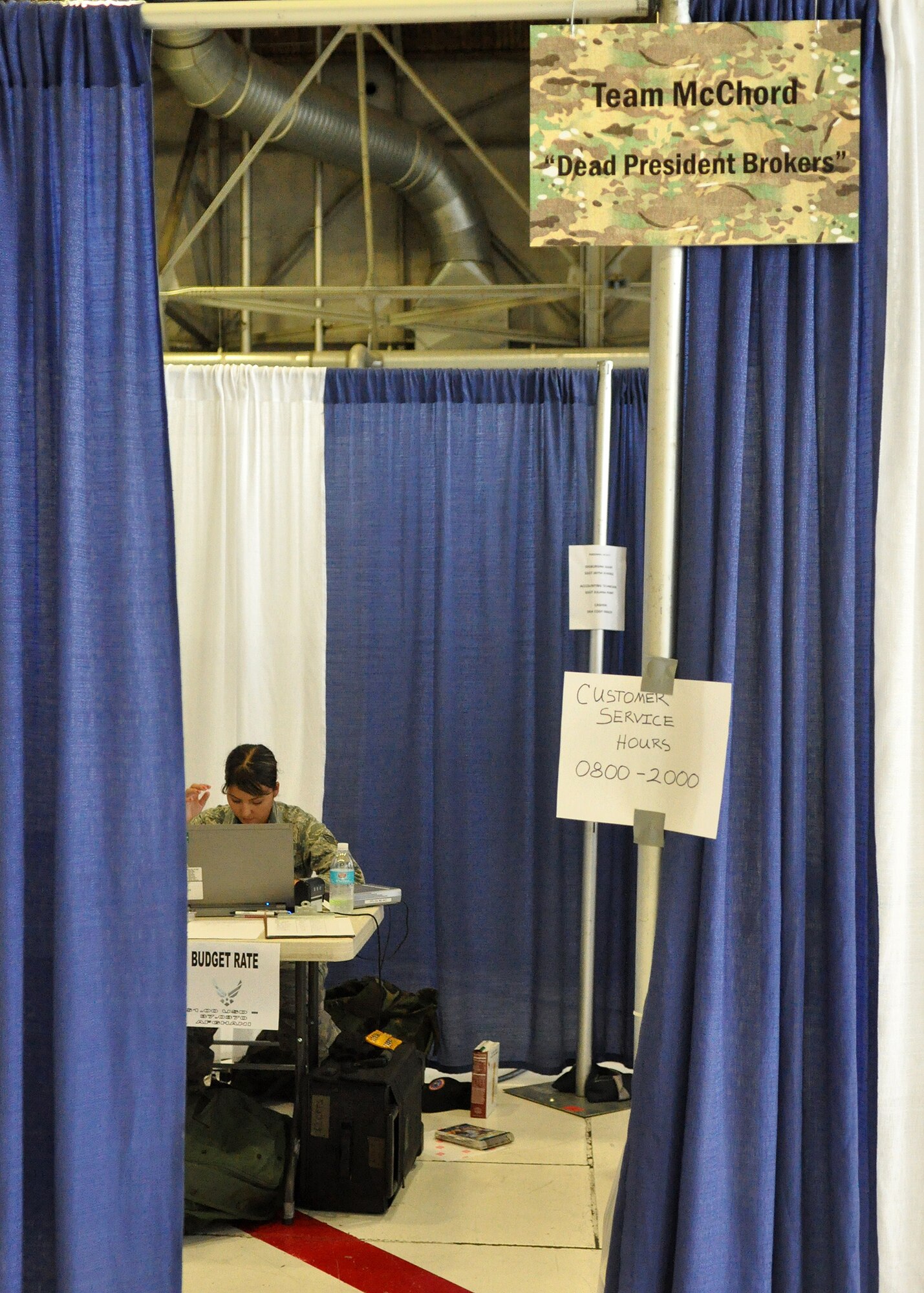 Staff Sgt. Juliana Perry, 62nd Financial Management team member, works through a financial scenario as part of the Rodeo competition July 25, 2011, at Joint Base Lewis-McChord, Wash. Rodeo is a bi-annual competition that encompasses all aspects of Air Mobility Command, including aerial port, aeromedical evacuation, maintenance, security forces, and for the first time, financial management. The team set up a simulated deployed environment and will compete in performance-based scenarios, small arms and a fitness course throughout the week. (U.S. Air Force photo/Airman 1st Class Leah Young) 