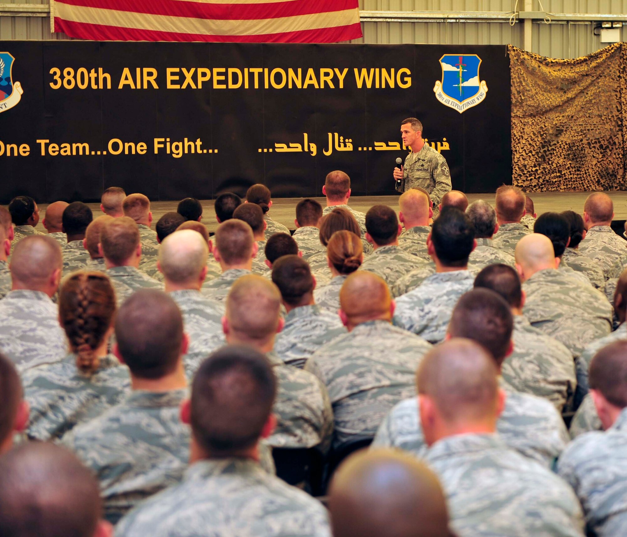 Chief Master Sgt. Richard A. Parsons, the Command Chief Master Sergeant for U.S. Air Forces Central Command, Southwest Asia, visits with the men and women of the 380th Air Expeditionary Wing, July 22, 2011. In the meeting with the Command Chief, the Airmen of the 380th had questions answered about issues that affect morale and mission effectiveness. Parsons gave the big picture vision and examples of how the 380th Airmen directly and indirectly provide support to overseas contingency operations.   (U.S. Air Force photo/Staff Sgt. Patrick Mitchell)