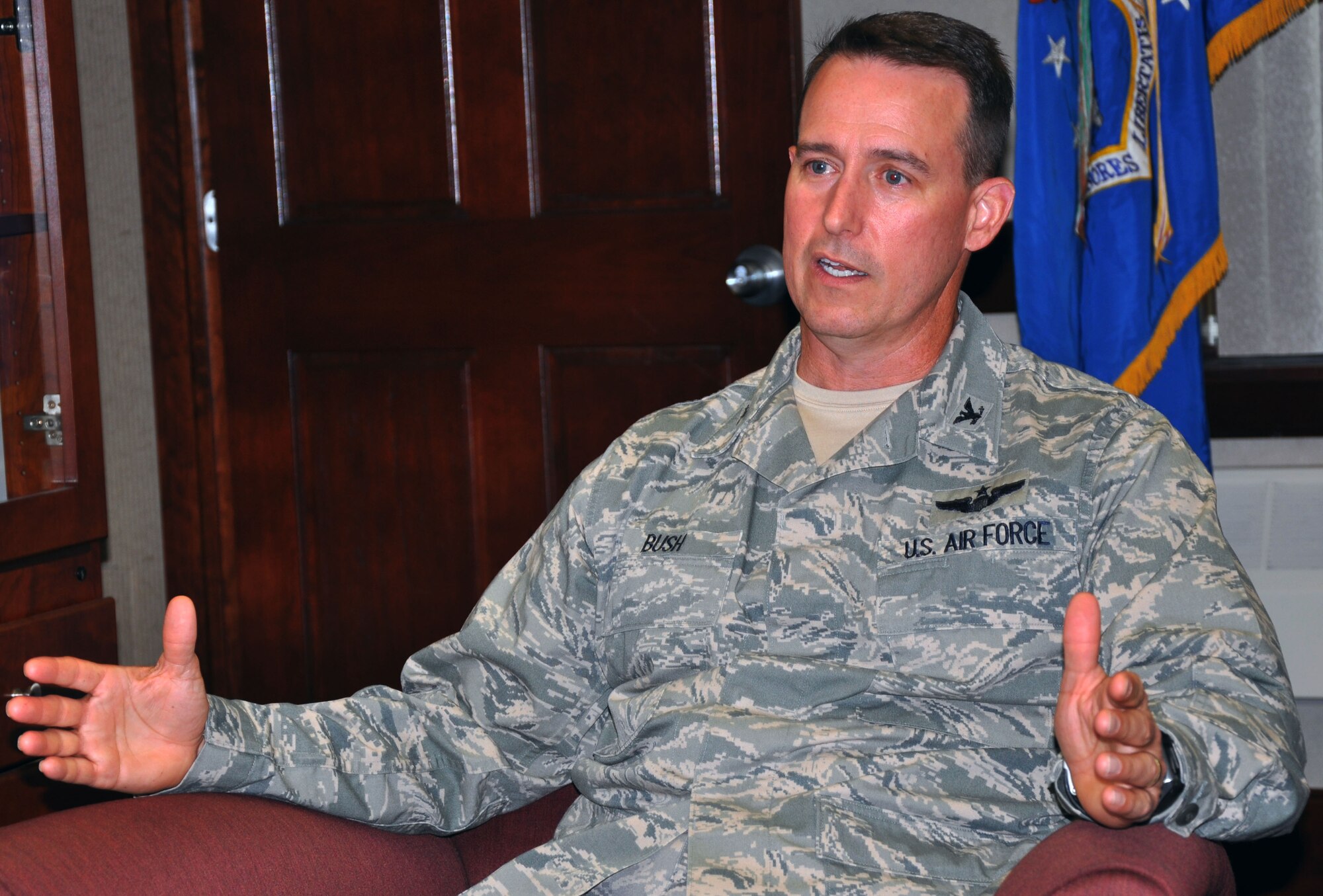 Col. Tim Bush, 319th Air Base Wing commander, speaks during an interview July 25, 2011 at Grand Forks Air Force Base. Colonel Bush took command of the Warriors of the North July 13 after serving as vice commander of the 92nd Air Refueling Wing at Fairchild Air Force Base, Wash.