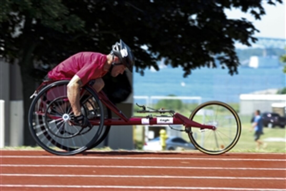 Former U.S. Marine Corps Sgt. Tim Connor, one of 59 paralympic military athletes, practices sprints in a racing wheelchair at McCool Memorial Track during the 2011 U.S. Olympic Committee Paralympic Military Sports Camp at Naval Station Newport, R.I., on July 16, 2011.  