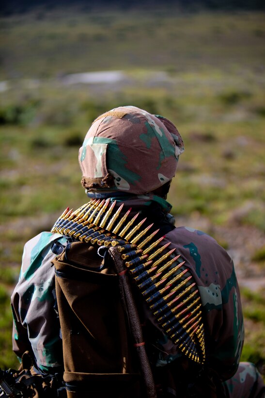 A South African National Defence Force machine waits to begin his advance during a joint U.S.-South African simulated assault on July 26 as part of Exercise Shared Accord 2011. SA ‘11 is a bi-lateral military training and civil assistance mission held annually throughout Africa. (U.S. Marine Corps photo by Cpl. Jad Sleiman)