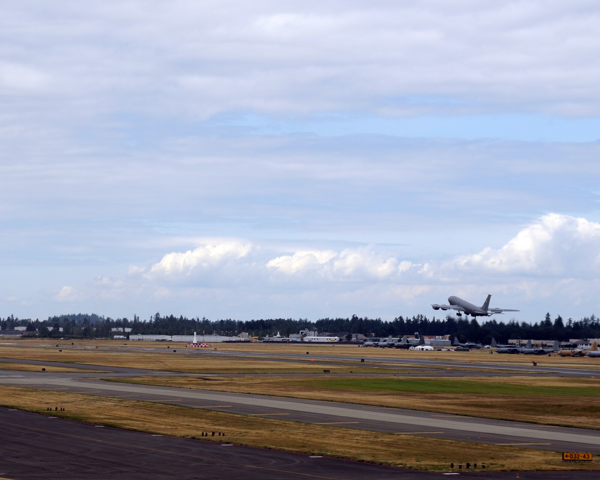 JOINT BASE LEWIS-MCCHORD, Wash. – A KC-135 Stratotanker from the 54th Air Refueling Squadron, Altus Air Force Base, Okla., takes flight from McChord Field for evening competitions at the 2011 Air Mobility Command Rodeo July 27. The crew will be judged on their ability to properly air refuel another aircraft, perform an instrument approach and other timed exercises during this flight. (U.S. Air Force photo by Airman 1st Class Kenneth W. Norman / Released / 97th Air Mobility Wing Rodeo Public Affairs)