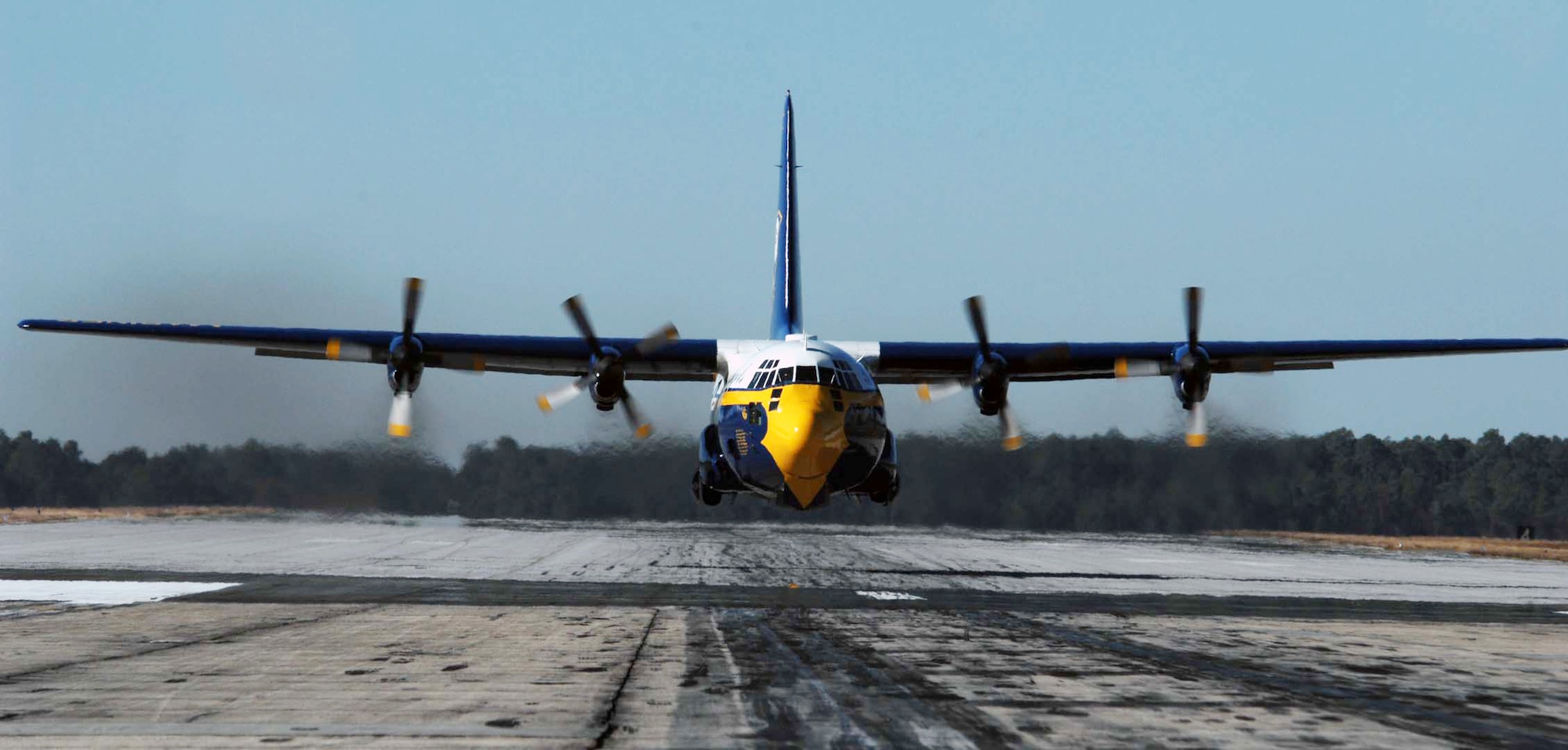 The Blue Angels C-130 cargo plane, "Fat Albert," prepares to land. Fat Albert accompanies the aerial demonstration team to every event, transporting equipment and maintenance personnel required for a successful show. (Courtey photo)
