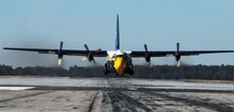 The Blue Angels C-130 cargo plane, "Fat Albert," prepares to land. Fat Albert accompanies the aerial demonstration team to every event, transporting equipment and maintenance personnel required for a successful show. (Courtey photo)