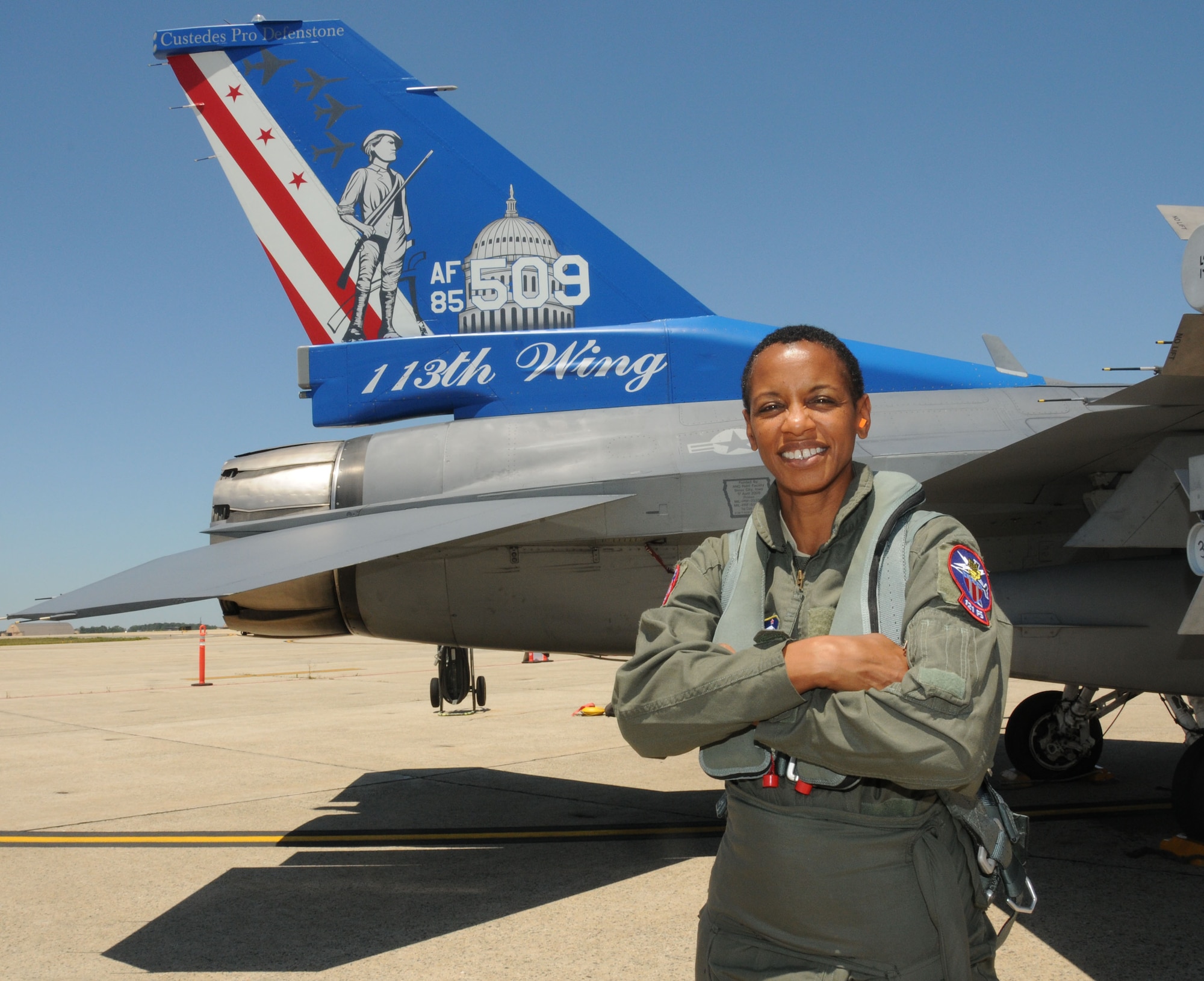 Rep. Donna Edwards stands in front of an F-16C Fighting Falcon prior to her flight aboard the jet with the 121st Fighter Squadron, 113th Wing, Joint Base Andrews, Md., June 29, 2011. This was the congresswoman’s first time aboard a fighter jet, a life-long desire she held since she was a young daughter of an Air Force veteran. (U.S. Air Force photo/Tech Sgt. Craig Clapper/Released)