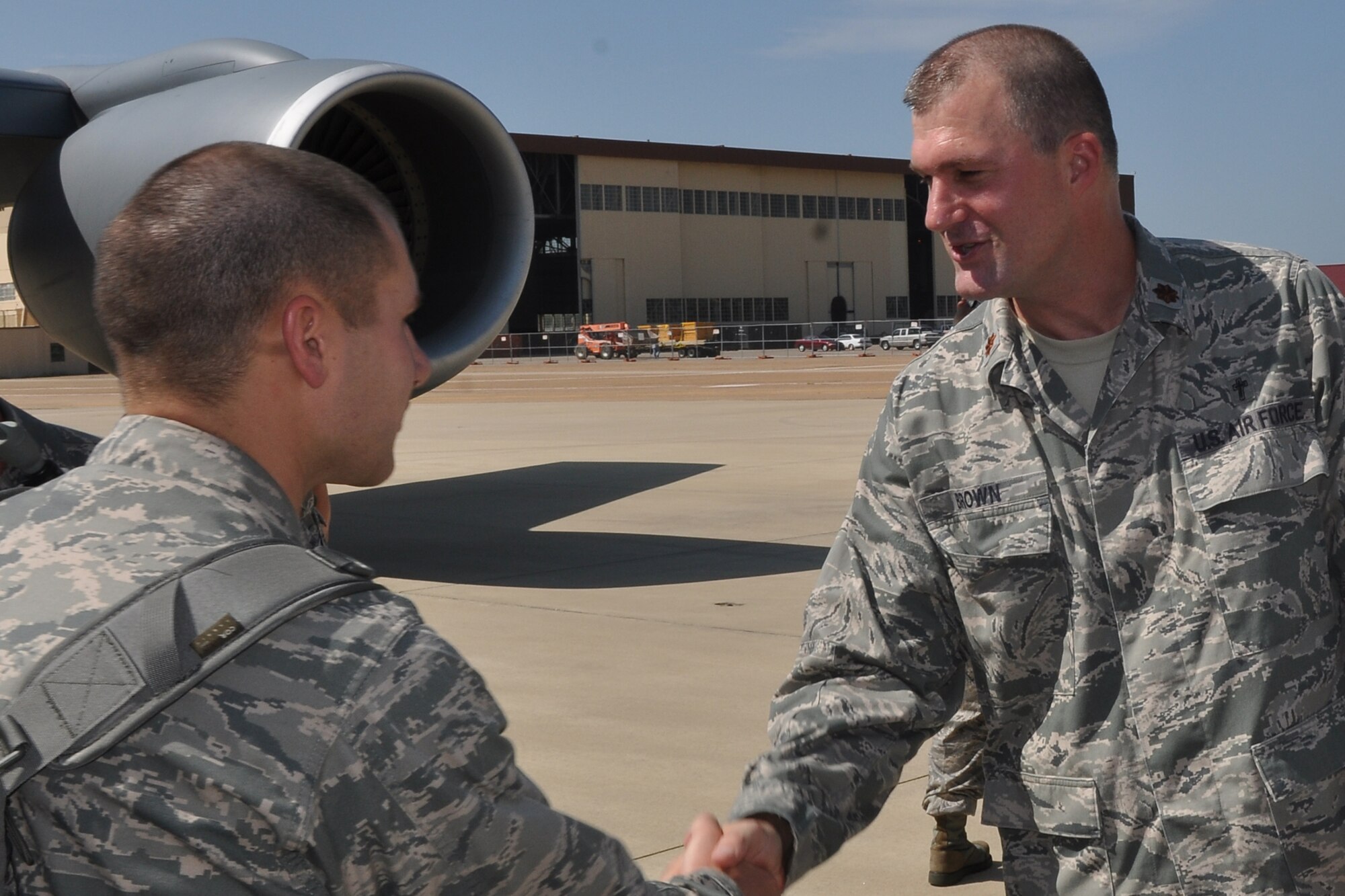 Maj. Kenneth Brown, the 307th Bomb Wing chaplain, greets a member of the Chaplain Candidate Intensive Internship Program at Barksdale Air Force Base, La. July 20, 2011.   The program is designed for incoming U.S. Air Force Reserve chaplains to get an overview of the different ministries available in the military.   Candidates visit five different military bases during this phase of training and come in contact with all branches of the military. (U.S. Air Force photo/Staff Sgt. Ted Daigle)
