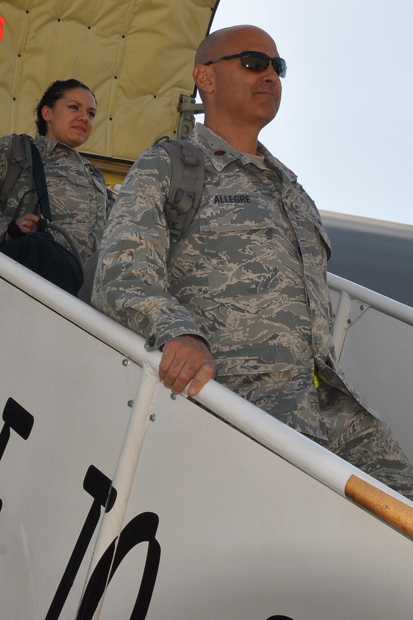 Maj. Pierre Allegre, a Chaplain Candidate Intensive Internship Program mentor, and Staff Sgt. Denise Johnson, a chaplain assistant with the program, arrive at Barksdale Air Force Base, La. July 20, 2011. The program is designed for incoming U.S. Air Force Reserve chaplains to get an overview of the different ministries that exist in the military.   Chaplain candidates visited Barksdale AFB to see how to best minister to base members assigned to a base with global strike capabilities. (U.S. Air Force photo/Staff Sgt. Ted Daigle) 