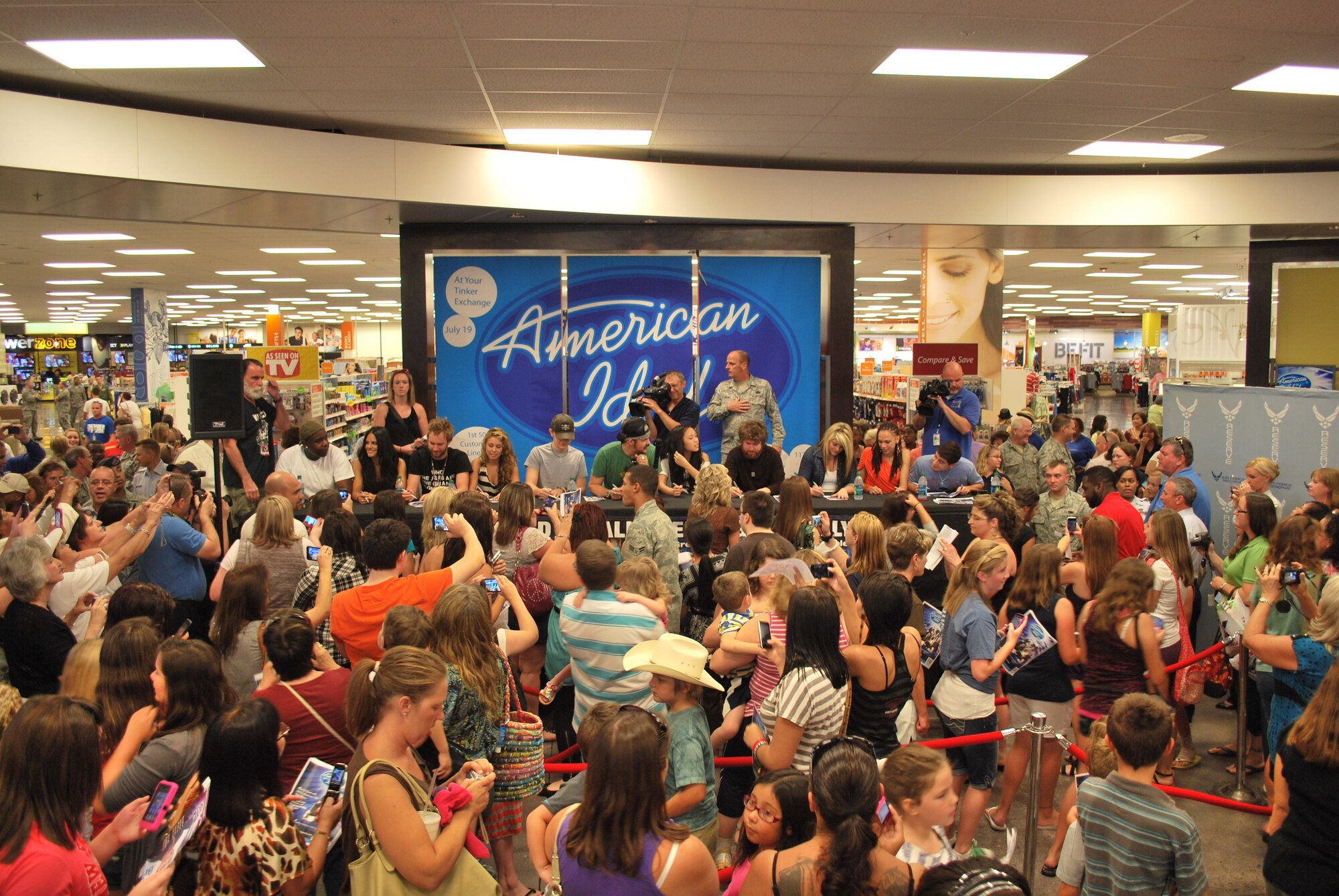 More than 2,000 military members and their families waited in line to receive autographed photos and have their pictures taken with their favorite American Idol entertainerJuly 19 at the Tinker Air Force Base Exchange.  The event was hosted by the Air Force Reserve Recruiting Service's "Get One Now" program. 
