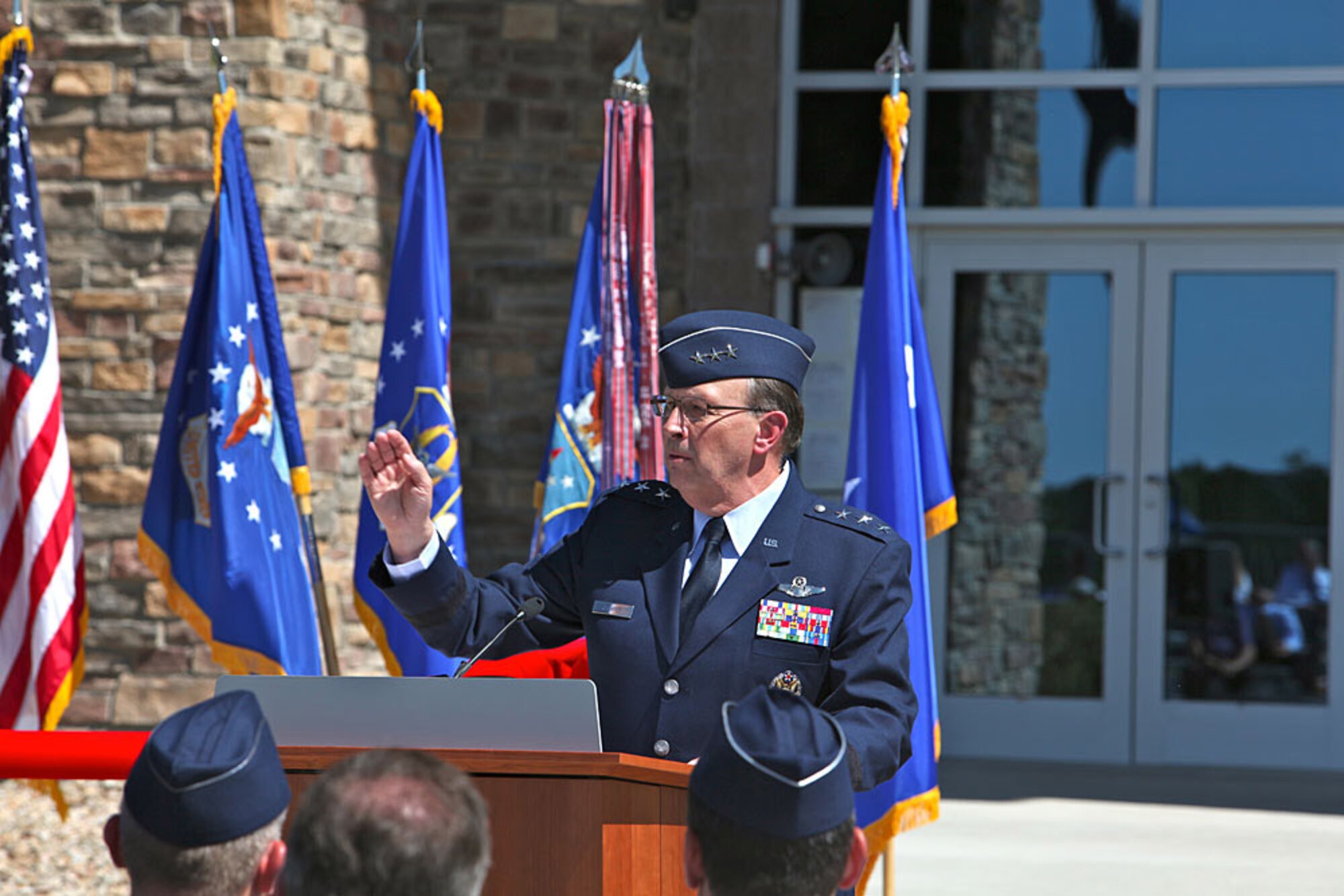 Lt. Gen. Charles E. Stenner Jr., commander of Air Force Reserve Command, speaks at the ceremony for the new Air Reserve Personnel Center July 19 at Buckley Air Force Base, Colo. The 80,000-square foot facility costs $17 million. The new personnel center is the first large-scale green facility in Air Force Reserve Command. (U.S. Air Force photo/Quinn Jacobson)