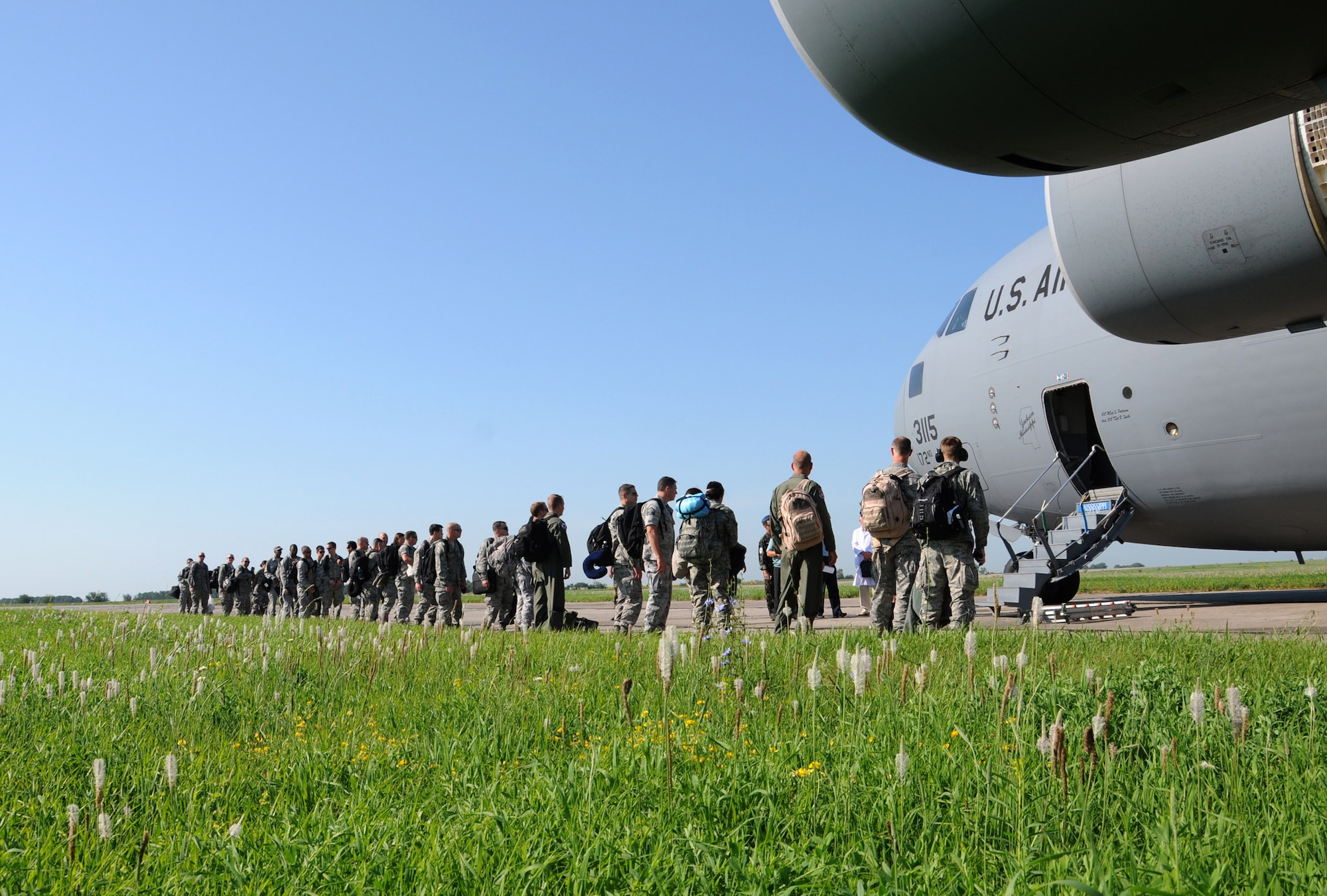 Members of the California and the Alabama Air National Guard arrive at Mirgorod Air Base, Ukraine, July 16, 2011, to take part in SAFE SKIES 2011.  SAFE SKIES 2011 is a military-to-military exchange between airmen from the U.S., Ukraine and Poland to enhance airspace security over the Ukraine and Poland in preparation for EURO 2012, the European soccer championship games. (U. S. Air Force photo/Tech. Sgt. Charles Vaughn)