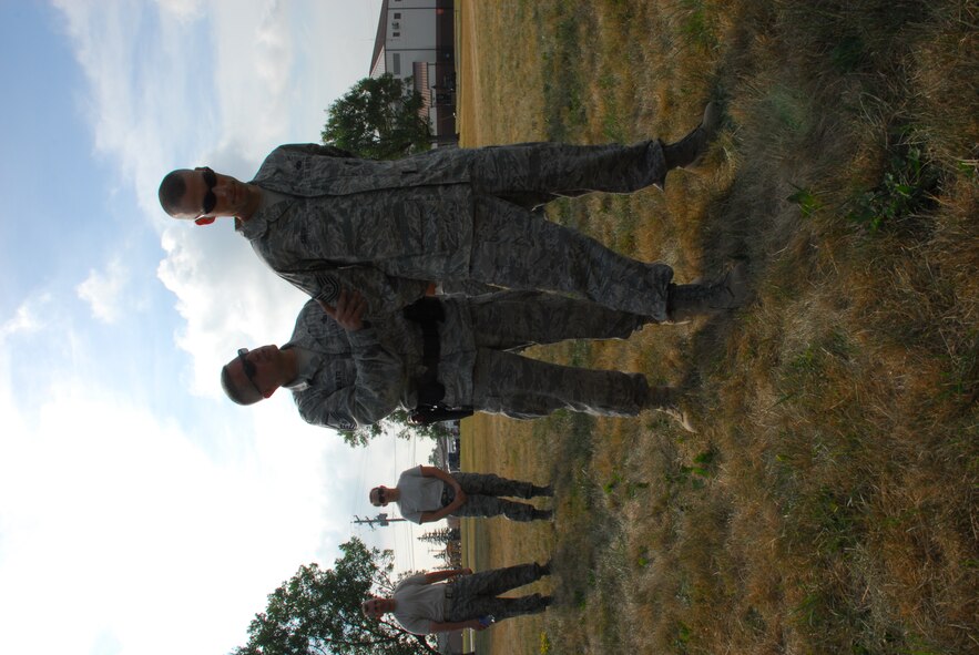 Led by Master Sgt Marvin DiPilato, 914th Security Forces training manager, Airmen from the 914th Security Forces Squadron instructs security forces augmentees on handcuffing techniques during the 914th Airlift Wing Unit Training Assembly July 22, 2011 Niagara Falls Air Reserve Station NY. The augmentees assist Military Law Enforcement with many aspects of base security. 