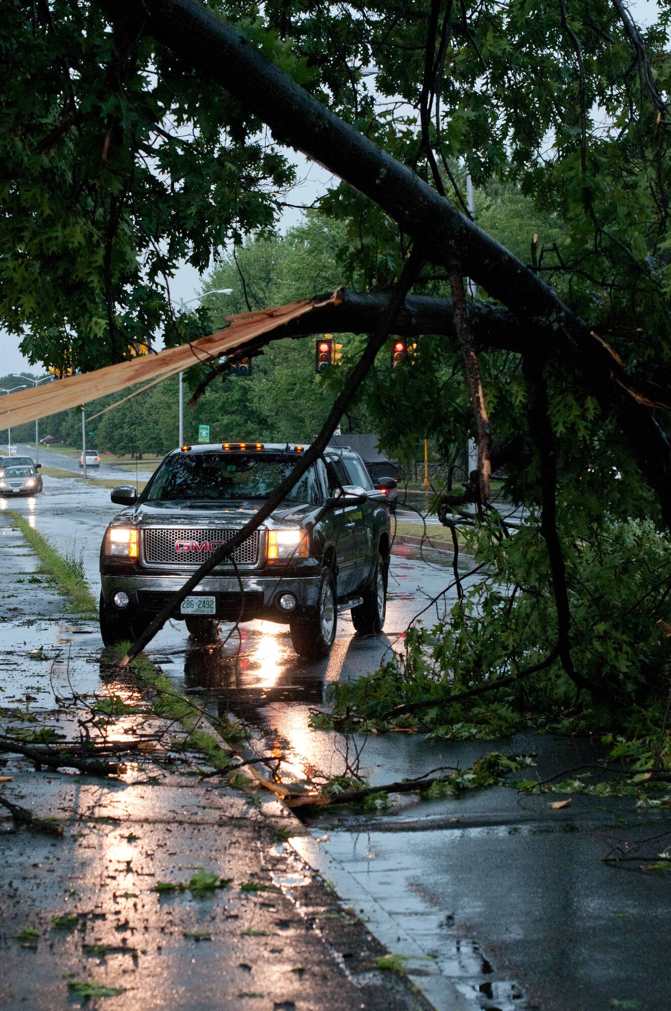 Another devastating storm hit western Massachusetts late afternoon, 26 July. Trees fell, blocking roadways; streets were flooded. The storm resulted in one reported fatality. (US Air Force photo/W.C.Pope)