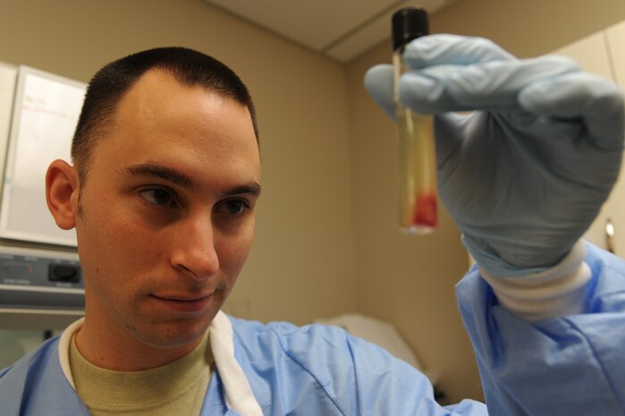 Senior Airman Ken Frati analyzes a wound culture for bacterial growth at the Joint Base Charleston - Air Base medical laboratory July 22. Airman Frati is a medical laboratory technician with the 628th Medical Group. (U.S. Air Force photo/Staff Sgt. Katie Gieratz) 