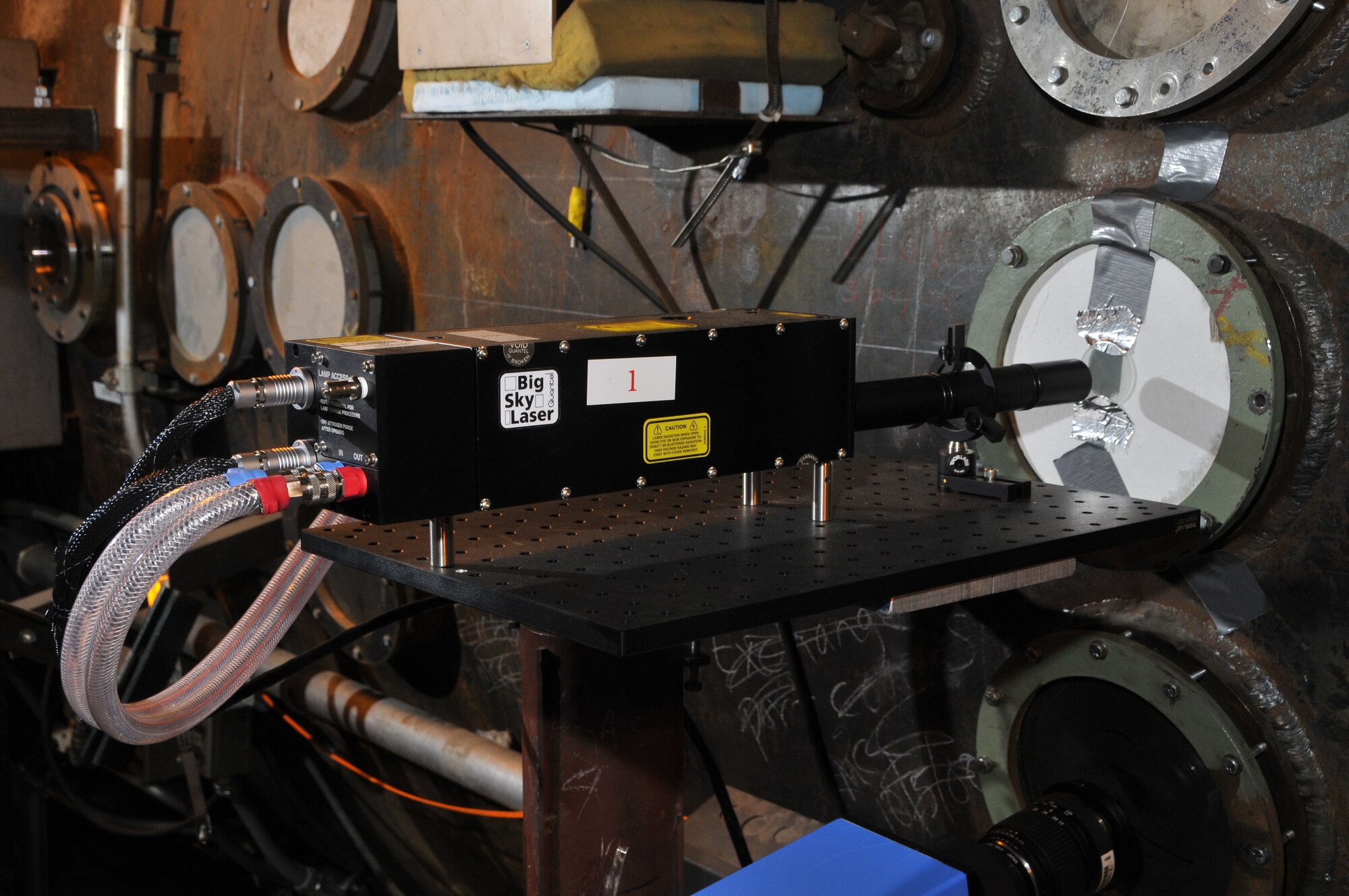 New equipment installed at AEDC’s Hypervelocity Ballistics Range G consists of a Dicam Pro camera made by the Cooke Corporation and a Quantel Laser CFR200. The new system for taking digital photos of projectiles in the range is less cumbersome and cuts back on time that was previously spent processing film. (Photo by Rick Goodfriend)