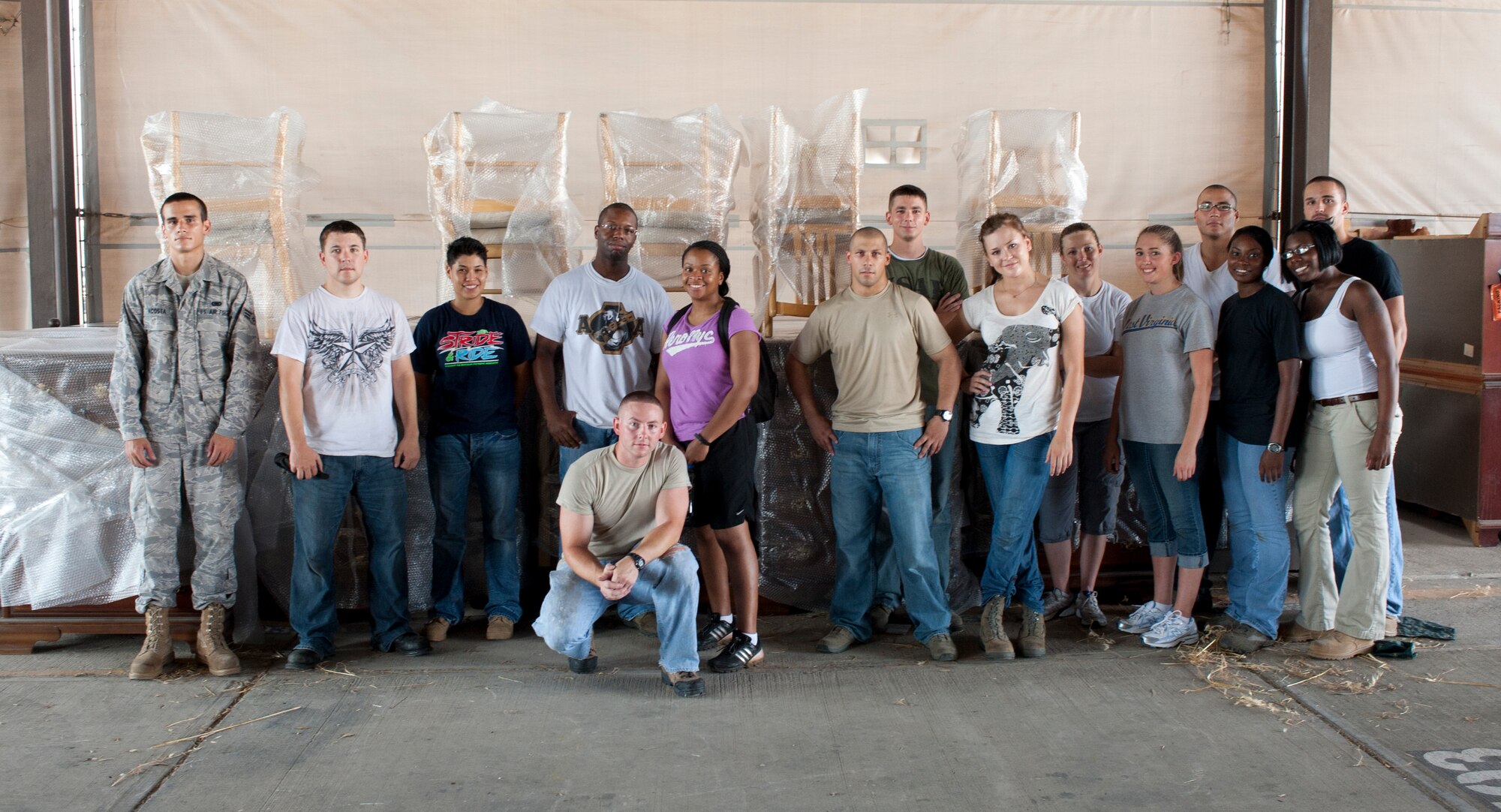 Volunteers from the 39th Air Base Wing prepared furniture for shipment in the Defense Logistics Agency Disposition Services warehouse July 25, 2011, at Incirlik Air Base Turkey. The furniture was issued to the U.S. State Department to be donated to an outpatient clinic in the Republic of Georgia and a school in Azerbaijan. (U.S. Air Force photo by Airman 1st Class Clayton Lenhardt/Released)