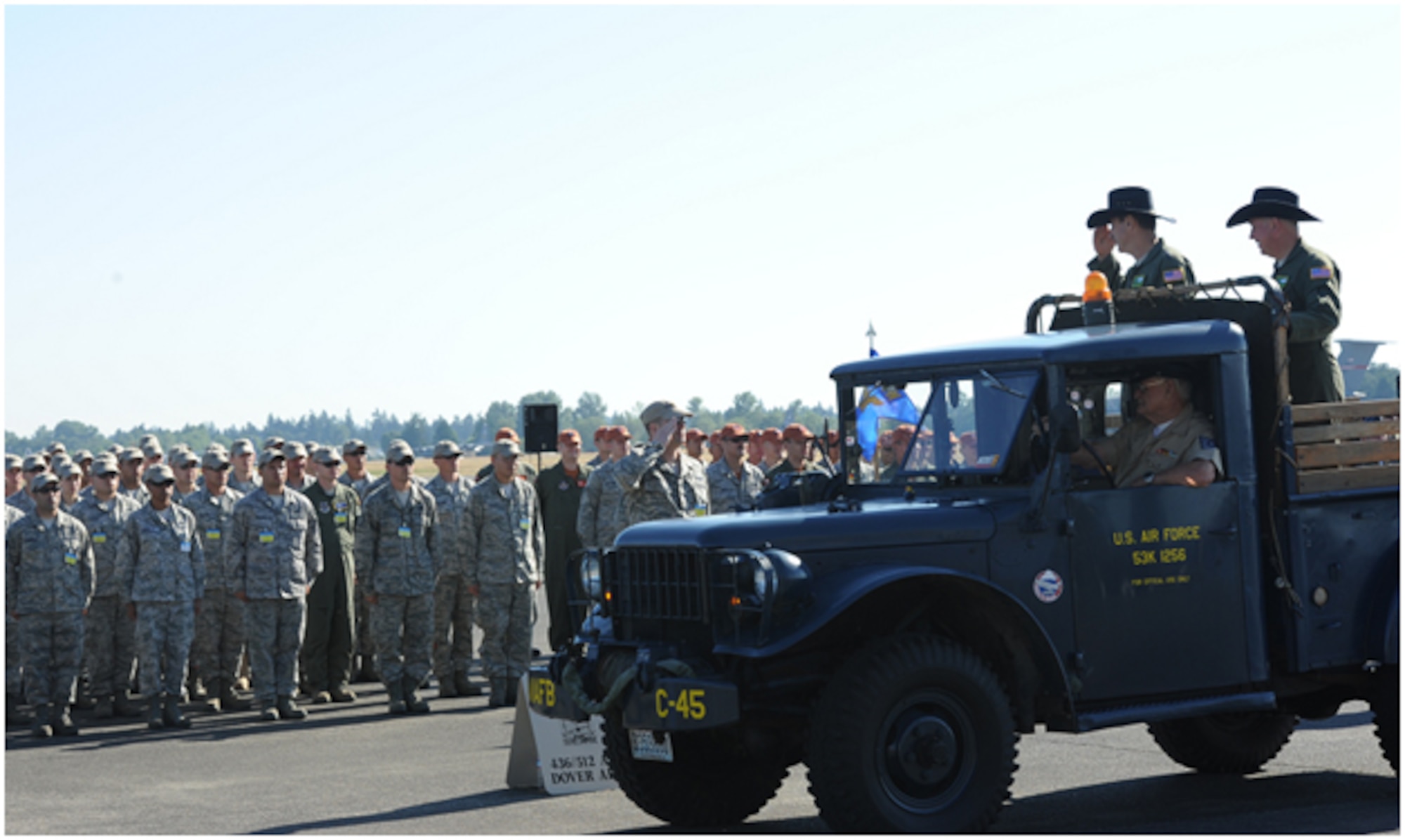 Gen. Raymond E. Johns Jr., the commander of Air Mobility Command, and Brig. Gen. Rick Martin, Rodeo commander, greet Team Dover in the pass and review during the opening ceremony for Air Mobility Command’s Rodeo competition. The commanders welcomed all the competing teams. There are approximately 150 teams and 3,000 people from across the Air Force, Air Force Reserve, and allied Nations competing in the rodeo.  (U.S. Air Force photo by 2nd Lt. Jennifer Guerrero)  