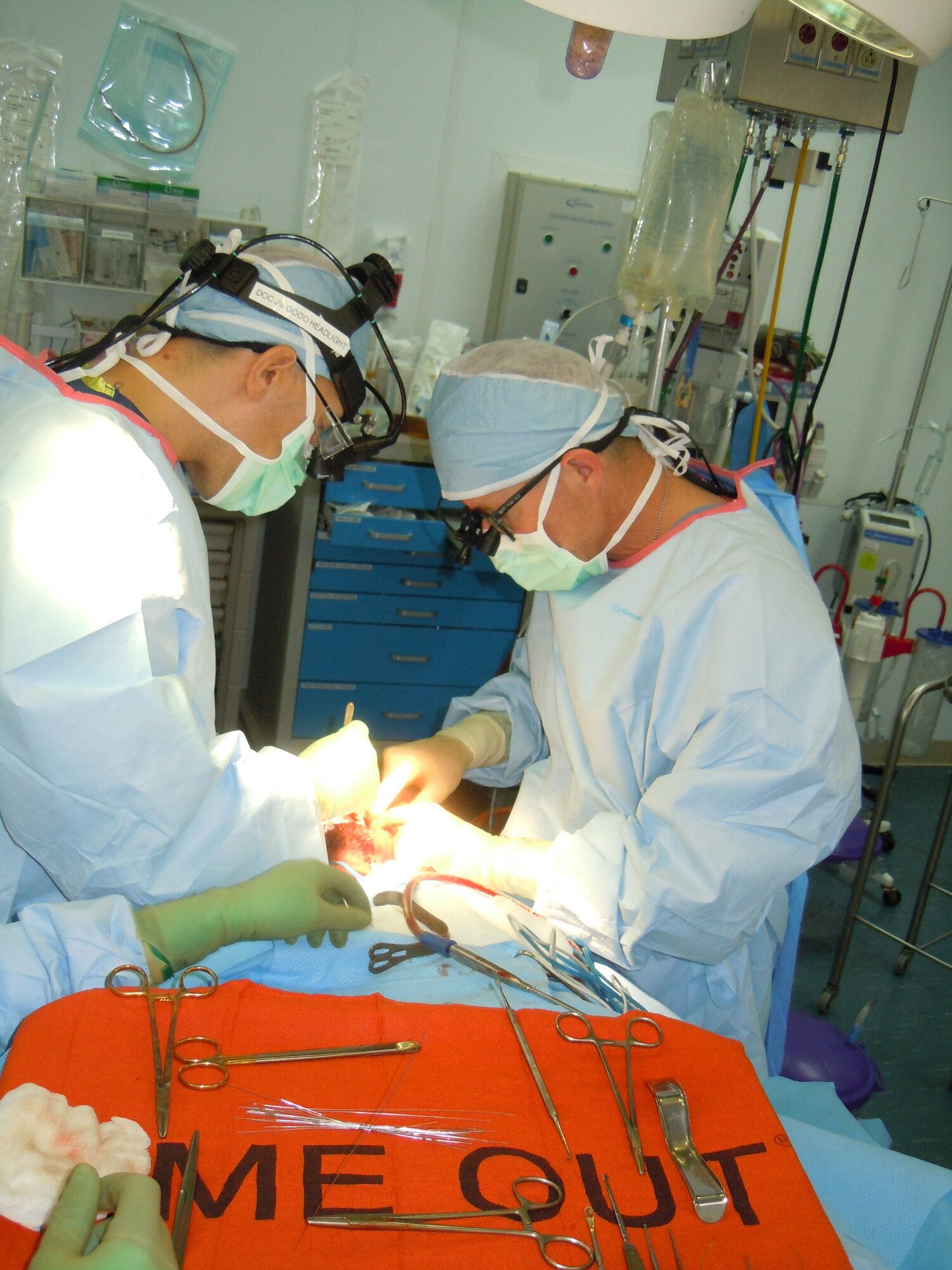 Air Force Lt. Col. (Dr.) Carlos Ayala, 455th Expeditionary Medical Group, chief of ear nose and throat/facial plastic surgery, performs a facial reconstruction on a patient at the Craig Joint Theater Hospital Here.  Ayala serves as the only facial plastic surgeon in Afghanistan and provides care to local nationals, Afghan National Police and U.S. service members who have experienced head or neck trauma. (Courtesy Photo)