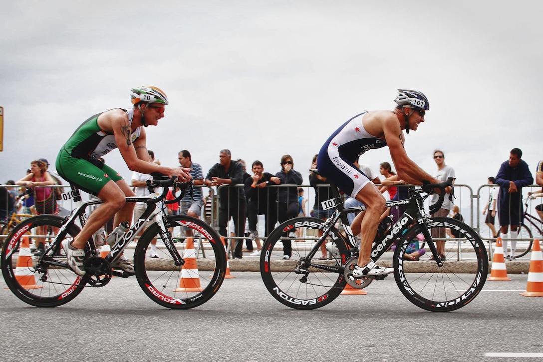 U.S. Marine Lt. Col. Gregory Price, competitor number 101, races in the triathlon event at the 5th International Military Sports Council World Games in Rio de Janeiro, Brazil, July 24, 2011. The United States had 141 troops representing all of the service branches competing in the games. 