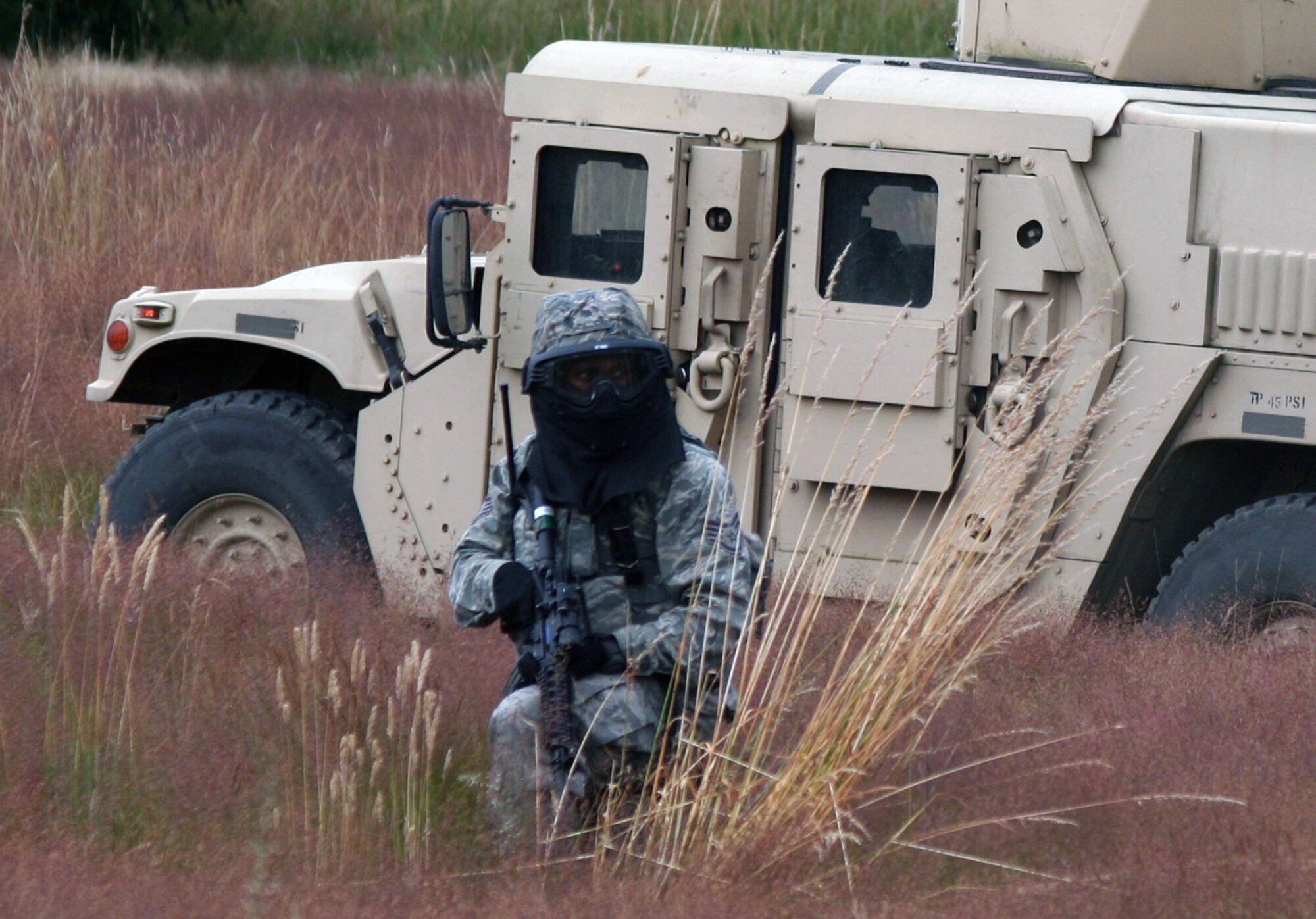 Security forces Airmen participate in the security forces tactics team competition for Air Mobility Rodeo 2011 on July 25, 2011, at Joint Base Lewis-McChord, Wash. Collins is from the 421st Combat Training Squadron at Joint Base McGuire-Dix-Lakehurst, N.J. Rodeo 2011, sponsored by the Air Mobility Command, is the Mobility Air Force's readiness competition. This competition focuses on improving worldwide air mobility forces' professional core abilities. More than 150 teams and 3,000 people from the Air Force, and Air Force Reserve, as well as allied nations are participating in Rodeo. (U.S. Air Force Photo/Master Sgt. Scott T. Sturkol)