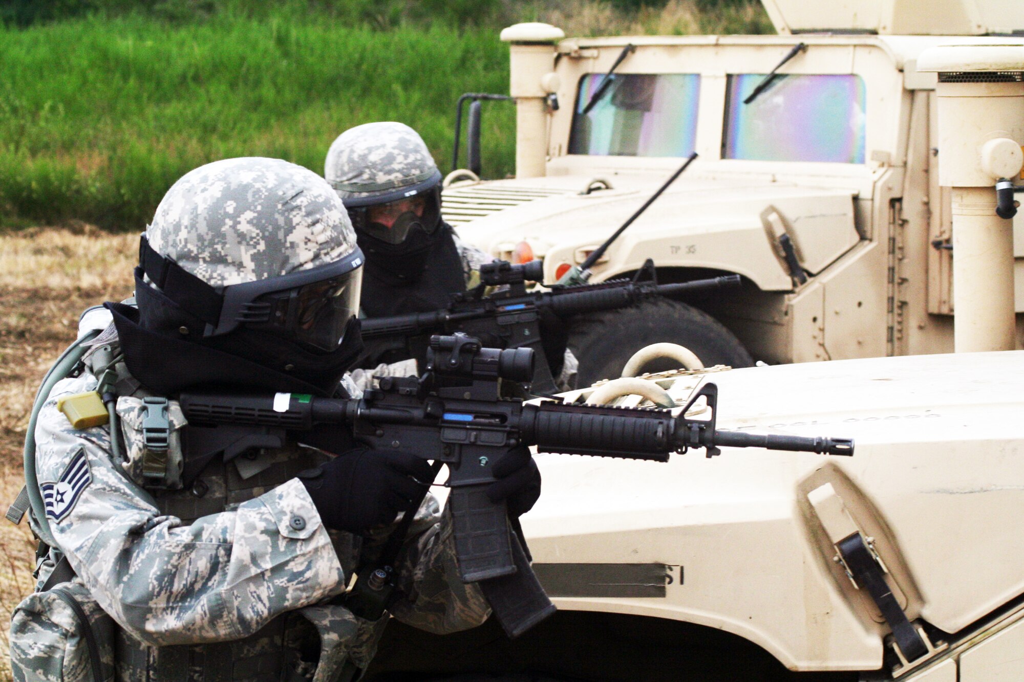 Security forces Airmen participate in the security forces tactics team competition for Air Mobility Rodeo 2011 on July 25, 2011, at Joint Base Lewis-McChord, Wash. Collins is from the 421st Combat Training Squadron at Joint Base McGuire-Dix-Lakehurst, N.J. Rodeo 2011, sponsored by the Air Mobility Command, is the Mobility Air Force's readiness competition. This competition focuses on improving worldwide air mobility forces' professional core abilities. More than 150 teams and 3,000 people from the Air Force, and Air Force Reserve, as well as allied nations are participating in Rodeo. (U.S. Air Force Photo/Master Sgt. Scott T. Sturkol)
