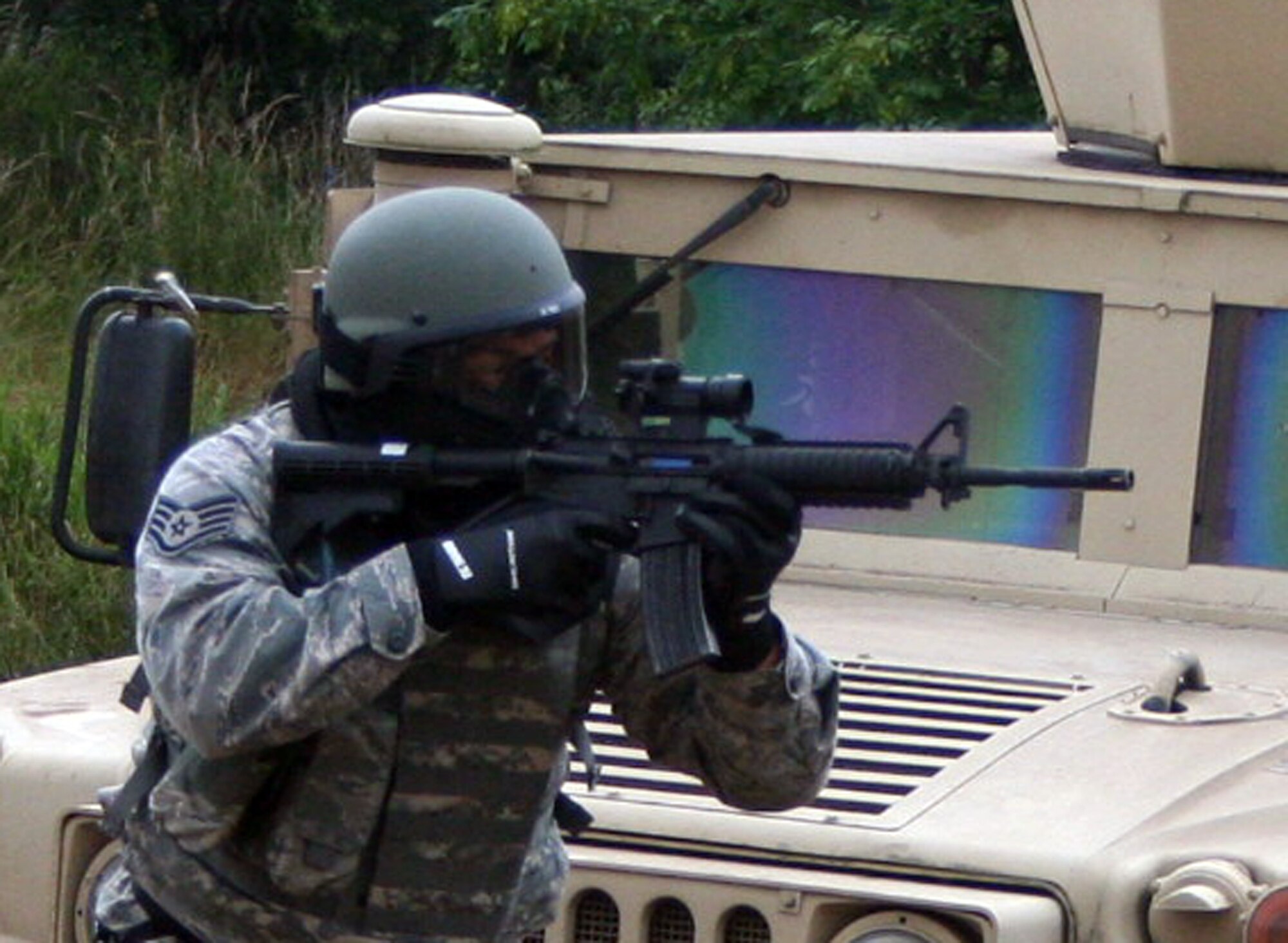 Security forces Airmen participate in the security forces tactics team competition for Air Mobility Rodeo 2011 on July 25, 2011, at Joint Base Lewis-McChord, Wash. Collins is from the 421st Combat Training Squadron at Joint Base McGuire-Dix-Lakehurst, N.J. Rodeo 2011, sponsored by the Air Mobility Command, is the Mobility Air Force's readiness competition. This competition focuses on improving worldwide air mobility forces' professional core abilities. More than 150 teams and 3,000 people from the Air Force, and Air Force Reserve, as well as allied nations are participating in Rodeo. (U.S. Air Force Photo/Master Sgt. Scott T. Sturkol)