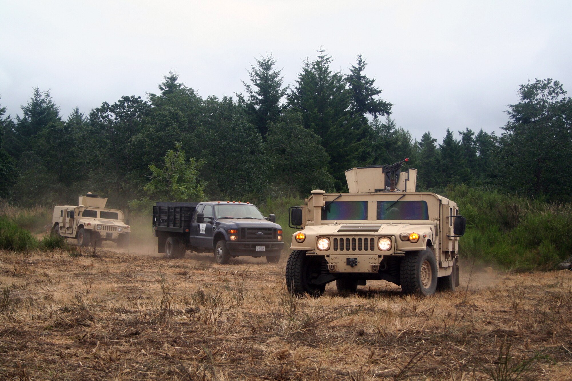 Security forces Airmen participate in the security forces tactics team competition for Air Mobility Rodeo 2011 on July 25, 2011, at Joint Base Lewis-McChord, Wash. Collins is from the 421st Combat Training Squadron at Joint Base McGuire-Dix-Lakehurst, N.J. Rodeo 2011, sponsored by the Air Mobility Command, is the Mobility Air Force's readiness competition. This competition focuses on improving worldwide air mobility forces' professional core abilities. More than 150 teams and 3,000 people from the Air Force, and Air Force Reserve, as well as allied nations are participating in Rodeo. (U.S. Air Force Photo/Master Sgt. Scott T. Sturkol)