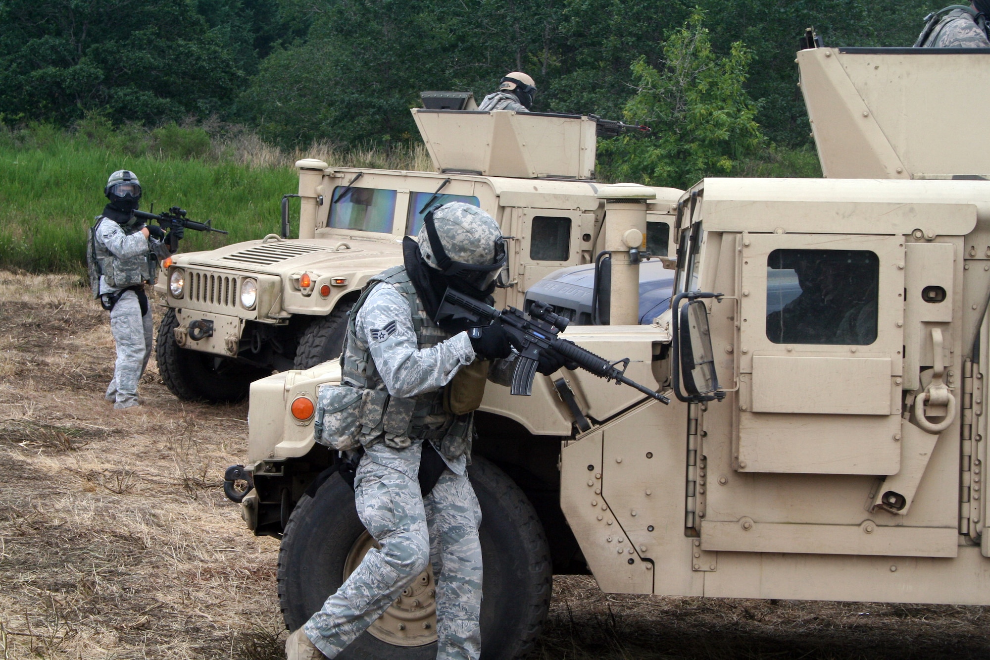 Security forces Airmen participate in the security forces tactics team competition for Air Mobility Rodeo 2011 on July 26, 2011, at Joint Base Lewis-McChord, Wash. Collins is from the 421st Combat Training Squadron at Joint Base McGuire-Dix-Lakehurst, N.J. Rodeo 2011, sponsored by the Air Mobility Command, is the Mobility Air Force's readiness competition. This competition focuses on improving worldwide air mobility forces' professional core abilities. More than 150 teams and 3,000 people from the Air Force, and Air Force Reserve, as well as allied nations are participating in Rodeo. (U.S. Air Force Photo/Master Sgt. Scott T. Sturkol)