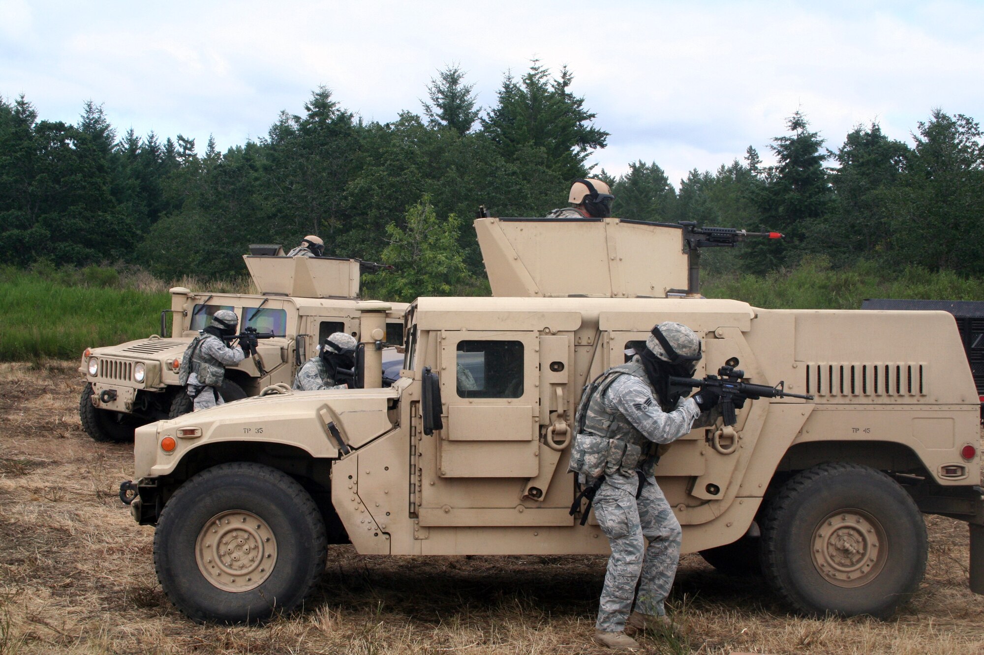 Security forces Airmen participate in the security forces tactics team competition for Air Mobility Rodeo 2011 on July 26, 2011, at Joint Base Lewis-McChord, Wash. Collins is from the 421st Combat Training Squadron at Joint Base McGuire-Dix-Lakehurst, N.J. Rodeo 2011, sponsored by the Air Mobility Command, is the Mobility Air Force's readiness competition. This competition focuses on improving worldwide air mobility forces' professional core abilities. More than 150 teams and 3,000 people from the Air Force, and Air Force Reserve, as well as allied nations are participating in Rodeo. (U.S. Air Force Photo/Master Sgt. Scott T. Sturkol)
