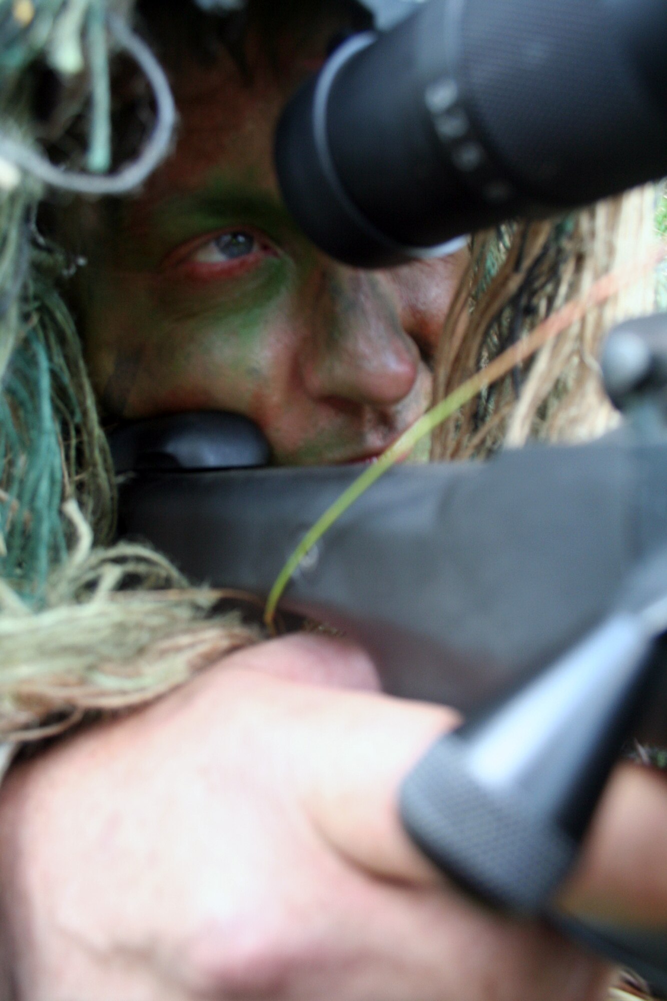 Senior Master Sgt. Nathan Brett, a sniper-qualified Airman in the Air Force, practices a scenario on a range on Joint Base Lewis-McChord, Wash., on July 27, 2011. Brett was one of the event coordinators for the advanced marksmanship event for Air Mobility Rodeo 2011 at Joint Base Lewis-McChord. Brett is the superintendent of the U.S. Air Force Expeditionary Center's 421st Combat Training Squadron at Joint Base McGuire-Dix-Lakehurst, N.J. (U.S. Air Force Photo/Master Sgt. Scott T. Sturkol)