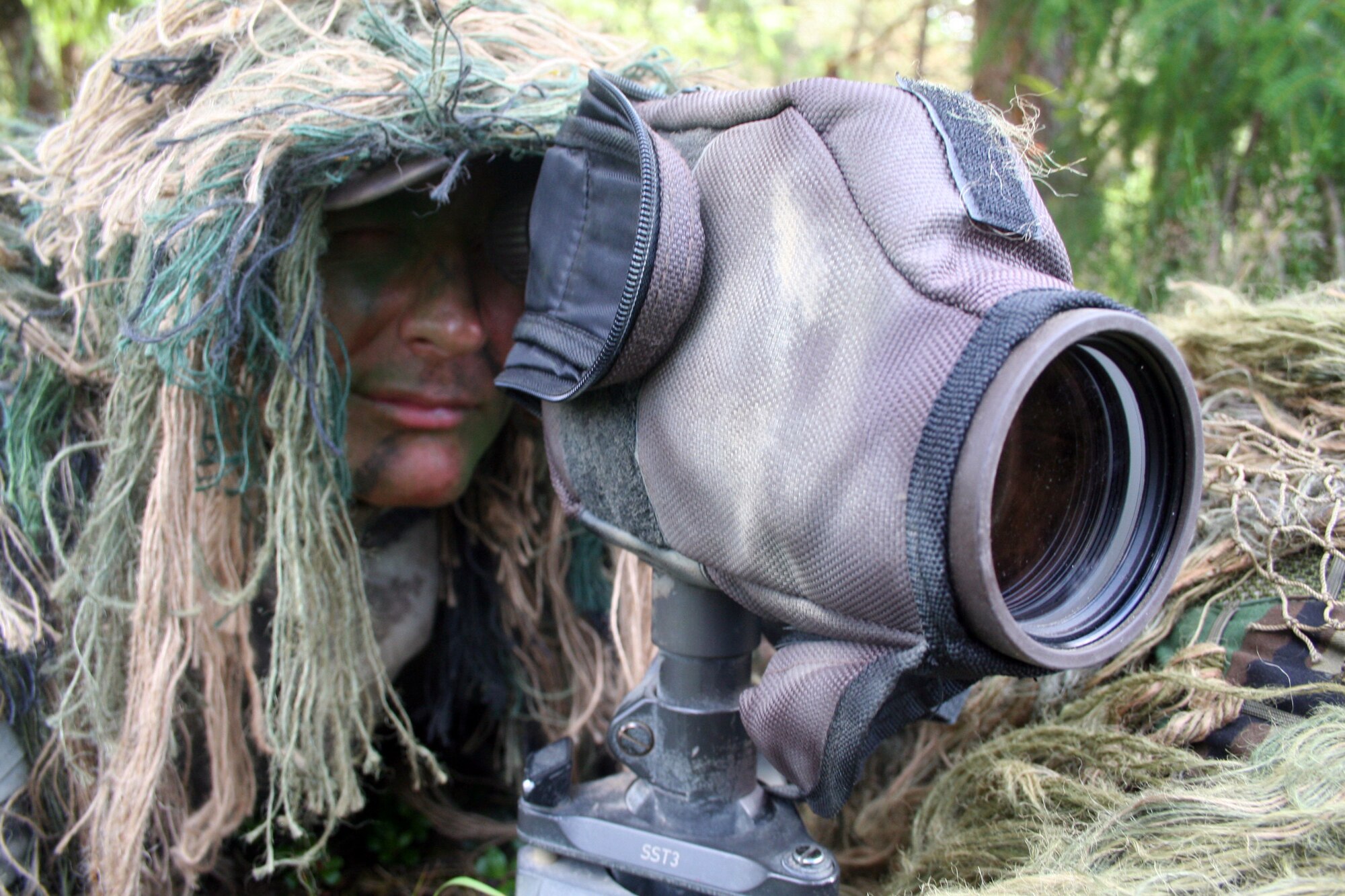Senior Master Sgt. Nathan Brett, a sniper-qualified Airman in the Air Force, practices a scenario on a range on Joint Base Lewis-McChord, Wash., on July 27, 2011. Brett was one of the event coordinators for the advanced marksmanship event for Air Mobility Rodeo 2011 at Joint Base Lewis-McChord. Brett is the superintendent of the U.S. Air Force Expeditionary Center's 421st Combat Training Squadron at Joint Base McGuire-Dix-Lakehurst, N.J. (U.S. Air Force Photo/Master Sgt. Scott T. Sturkol)