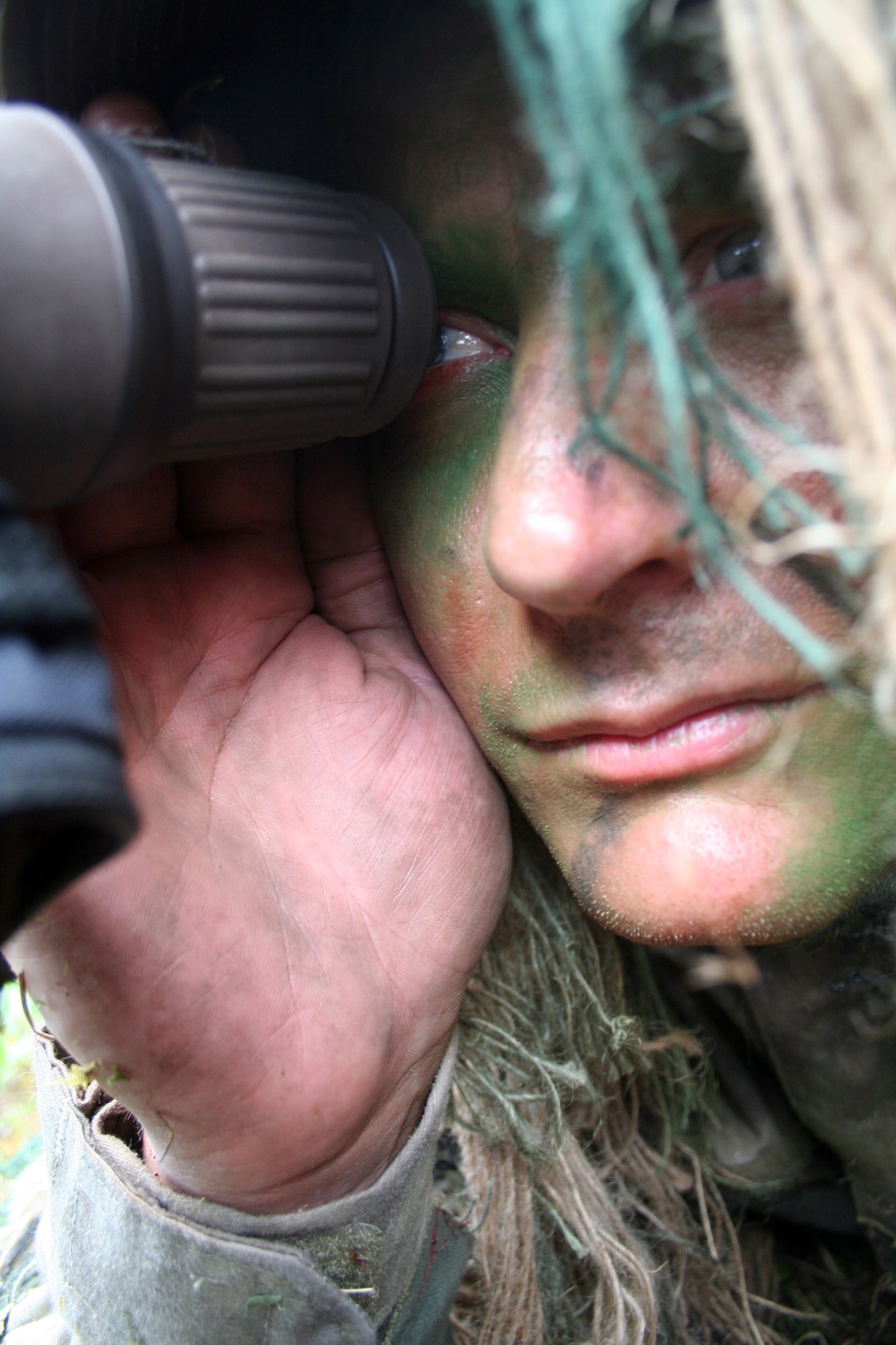 Senior Master Sgt. Nathan Brett, a sniper-qualified Airman in the Air Force, practices a scenario on a range on Joint Base Lewis-McChord, Wash., on July 27, 2011. Brett was one of the event coordinators for the advanced marksmanship event for Air Mobility Rodeo 2011 at Joint Base Lewis-McChord. Brett is the superintendent of the U.S. Air Force Expeditionary Center's 421st Combat Training Squadron at Joint Base McGuire-Dix-Lakehurst, N.J. (U.S. Air Force Photo/Master Sgt. Scott T. Sturkol)
